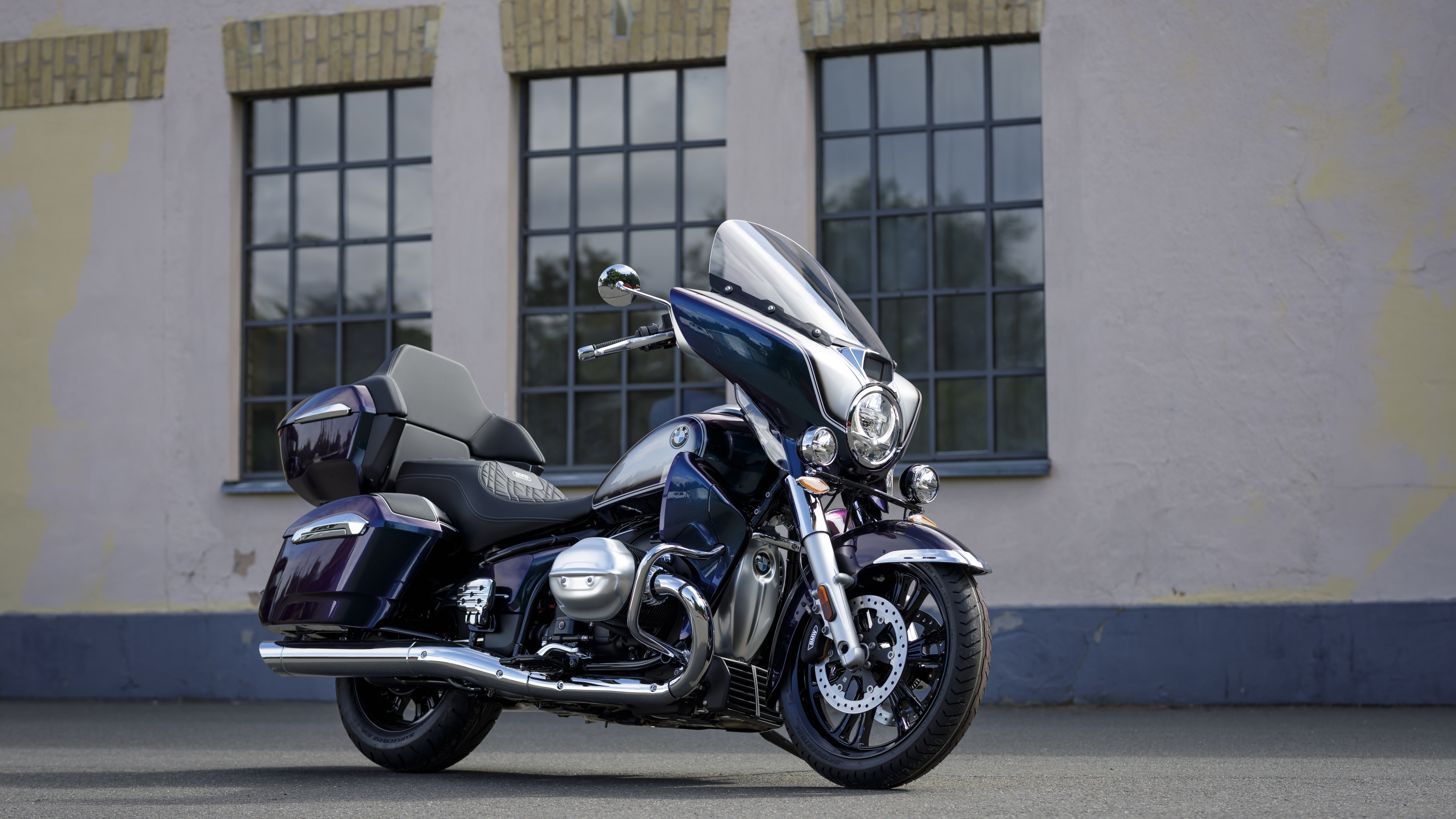 Detailed close-up of a 2021 BMW R 18 Transcontinental touring motorcycle with chrome finishes and premium engineering.