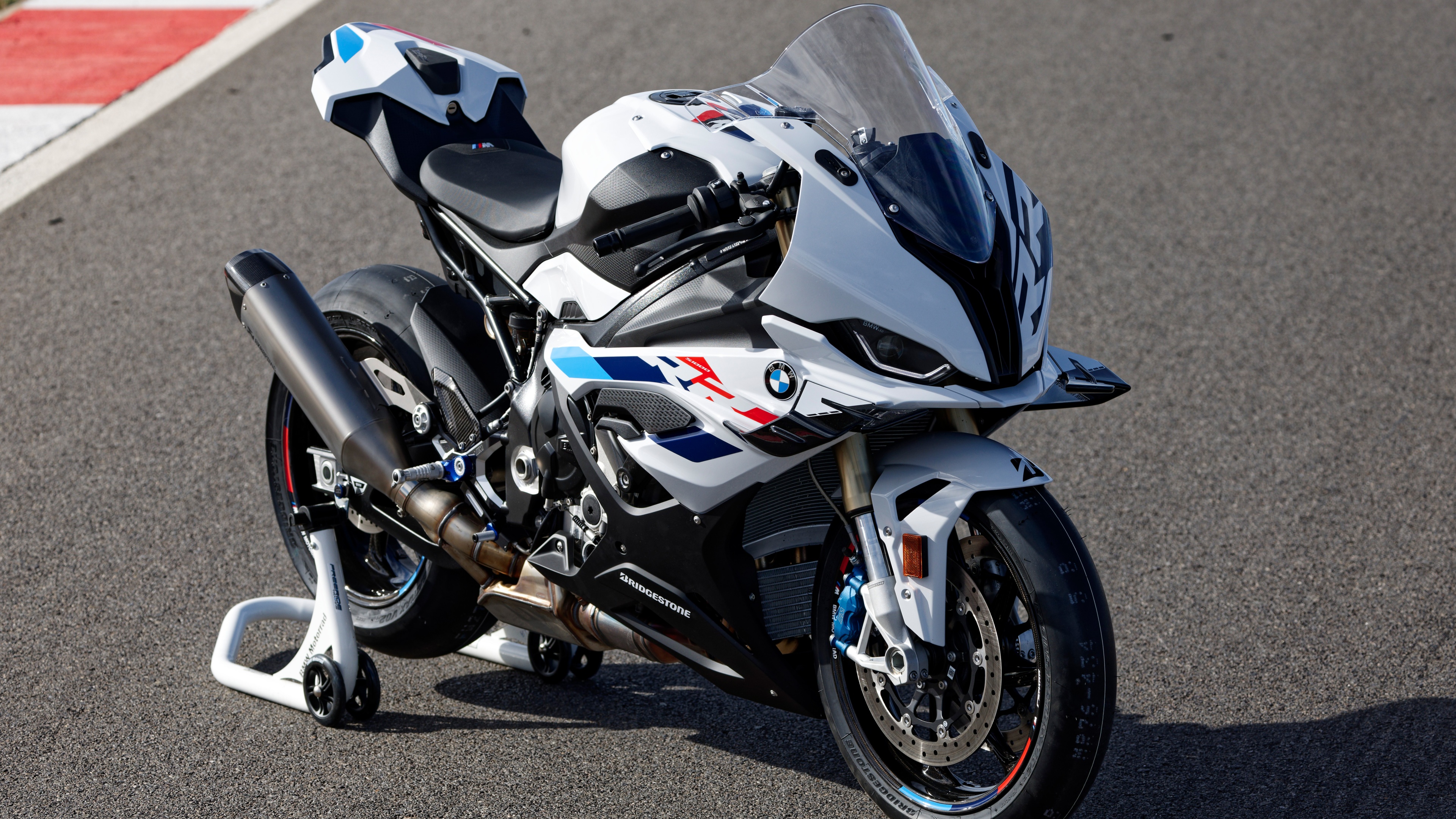A high-performance BMW S 1000 RR sports motorcycle featuring sharp aerodynamic lines and a sleek metallic finish.