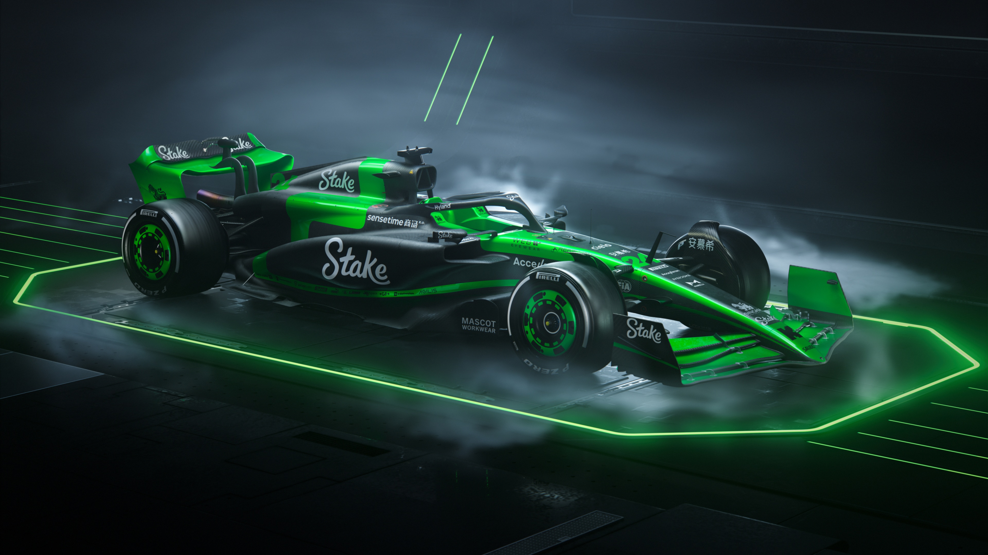 High-speed Formula One cars with dramatic lighting against a black background.