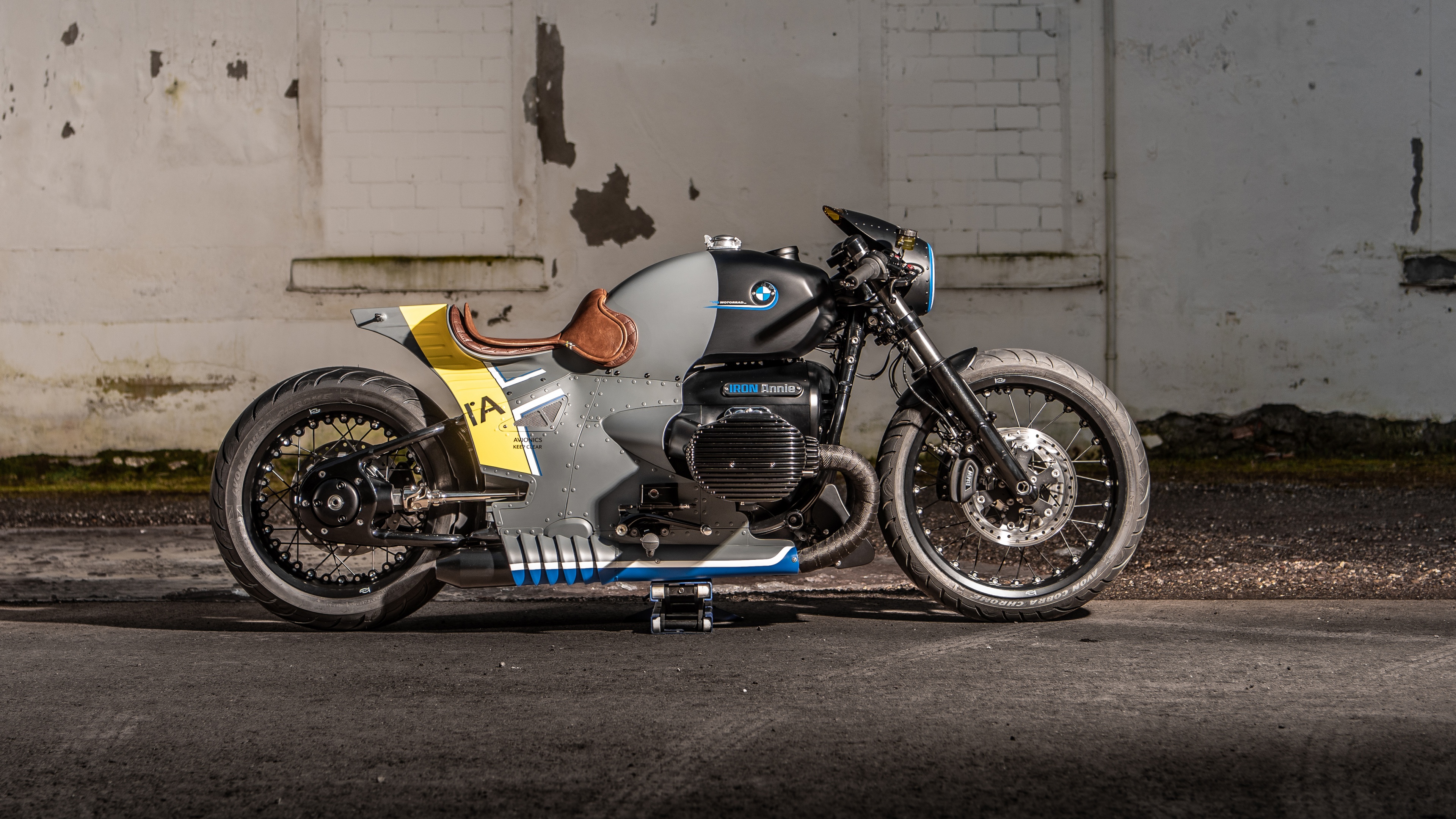 A highly detailed 2023 BMW R 18 custom motorcycle named Iron Annie, featuring a rugged industrial design and metallic components.