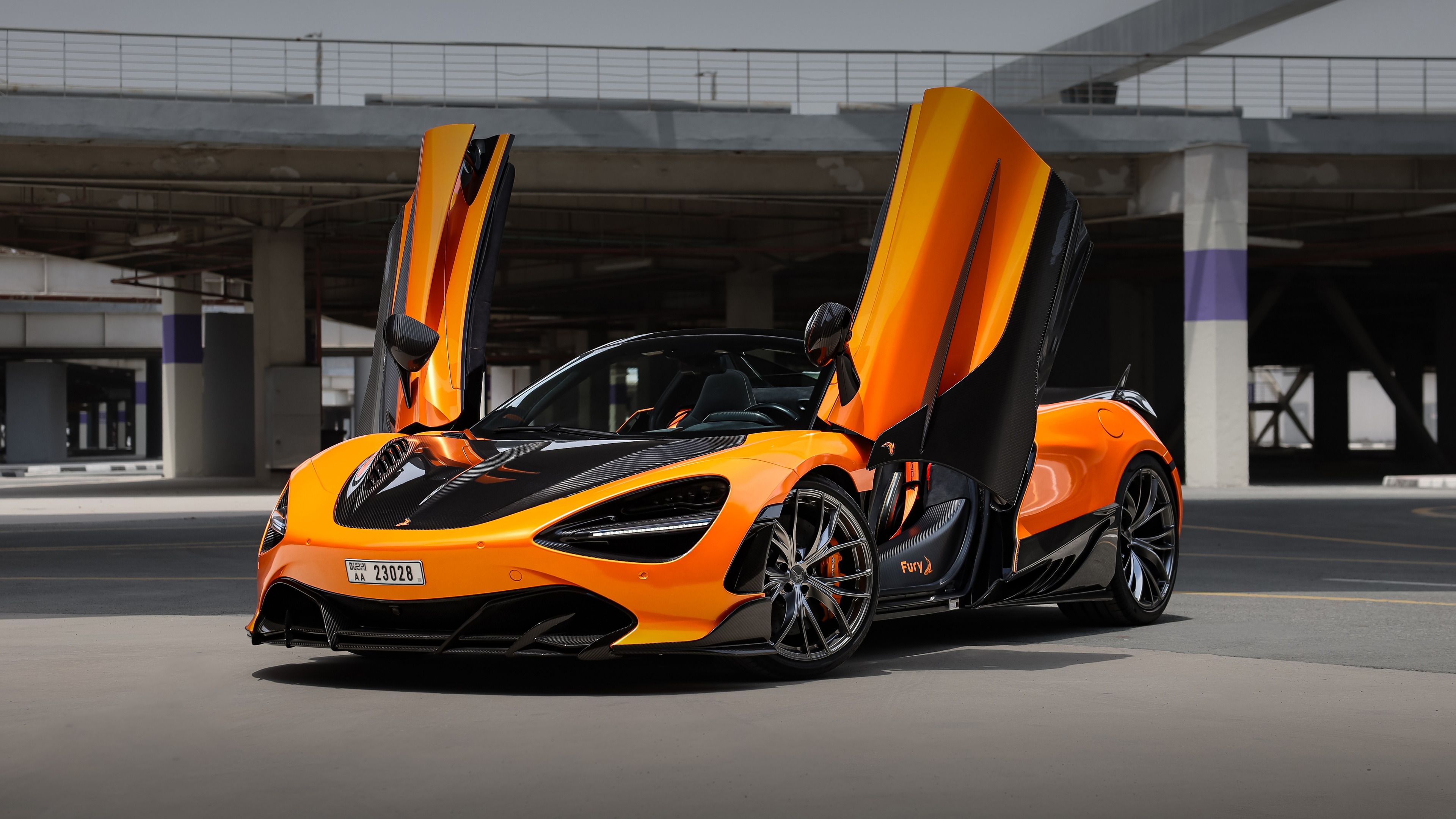 A luxurious McLaren 720S Spider with TopCar aerodynamic body kit and custom carbon fiber details.