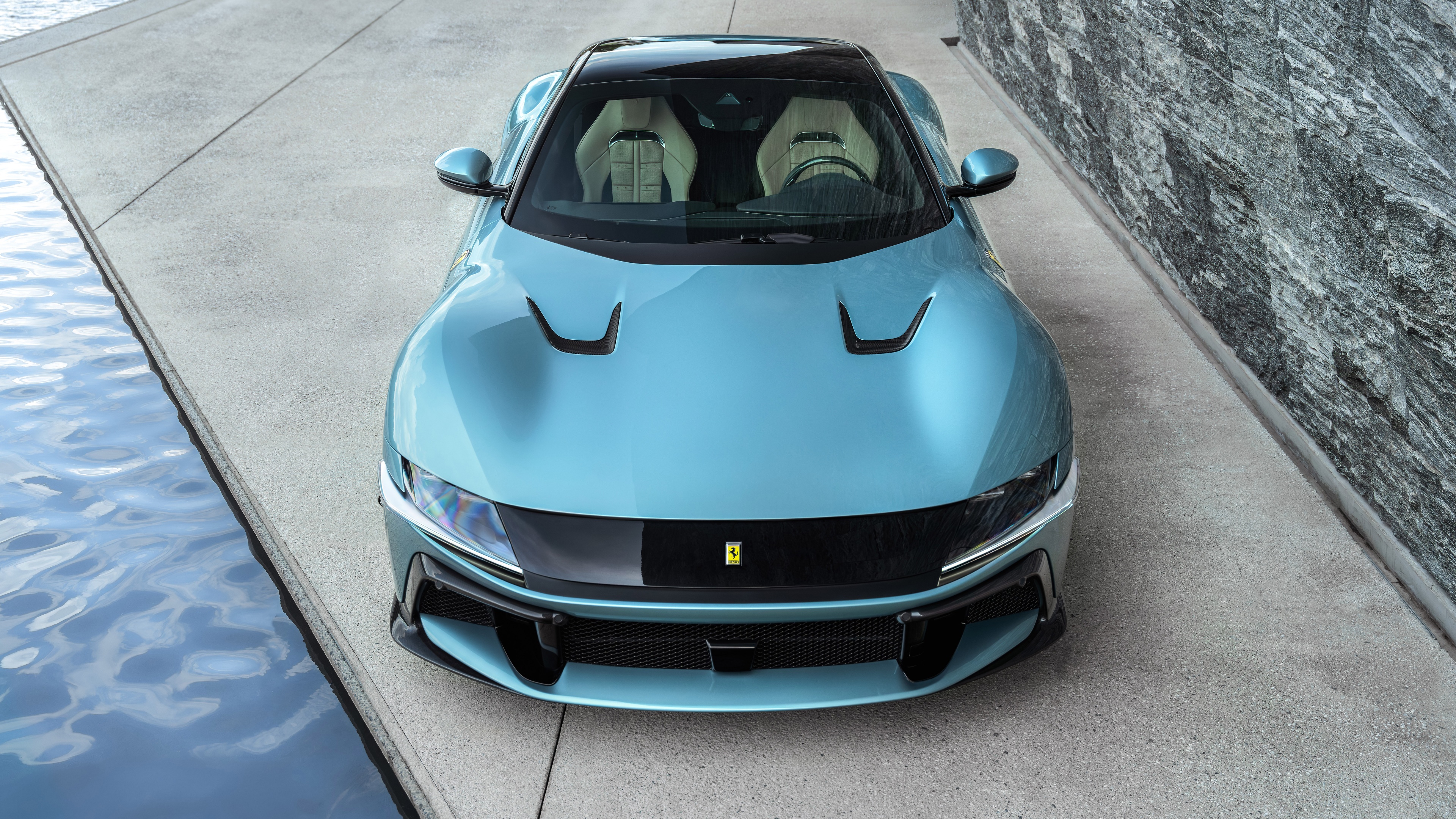 A detailed high-definition shot of the Ferrari 12Cilindri supercar, showcasing its luxury design and aerodynamic features.