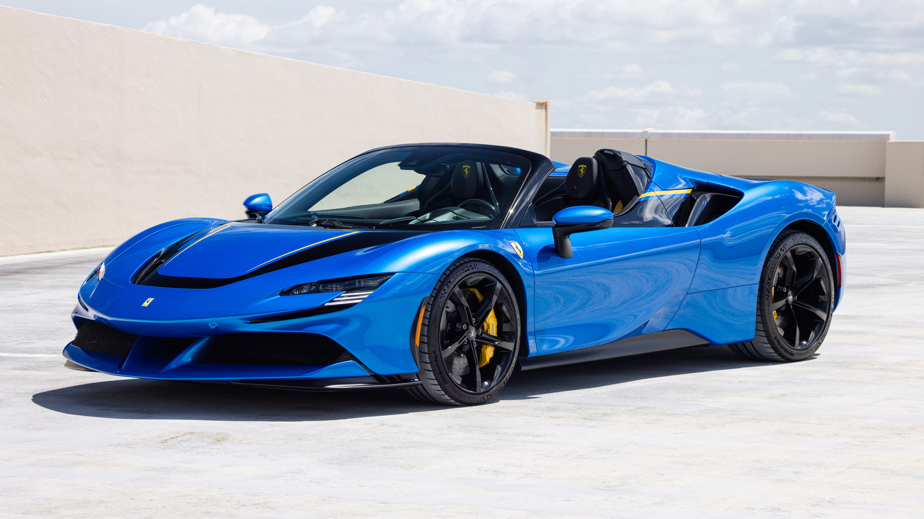 A high-performance Ferrari SF90 Spider sports car featuring aerodynamic design and luxury styling.