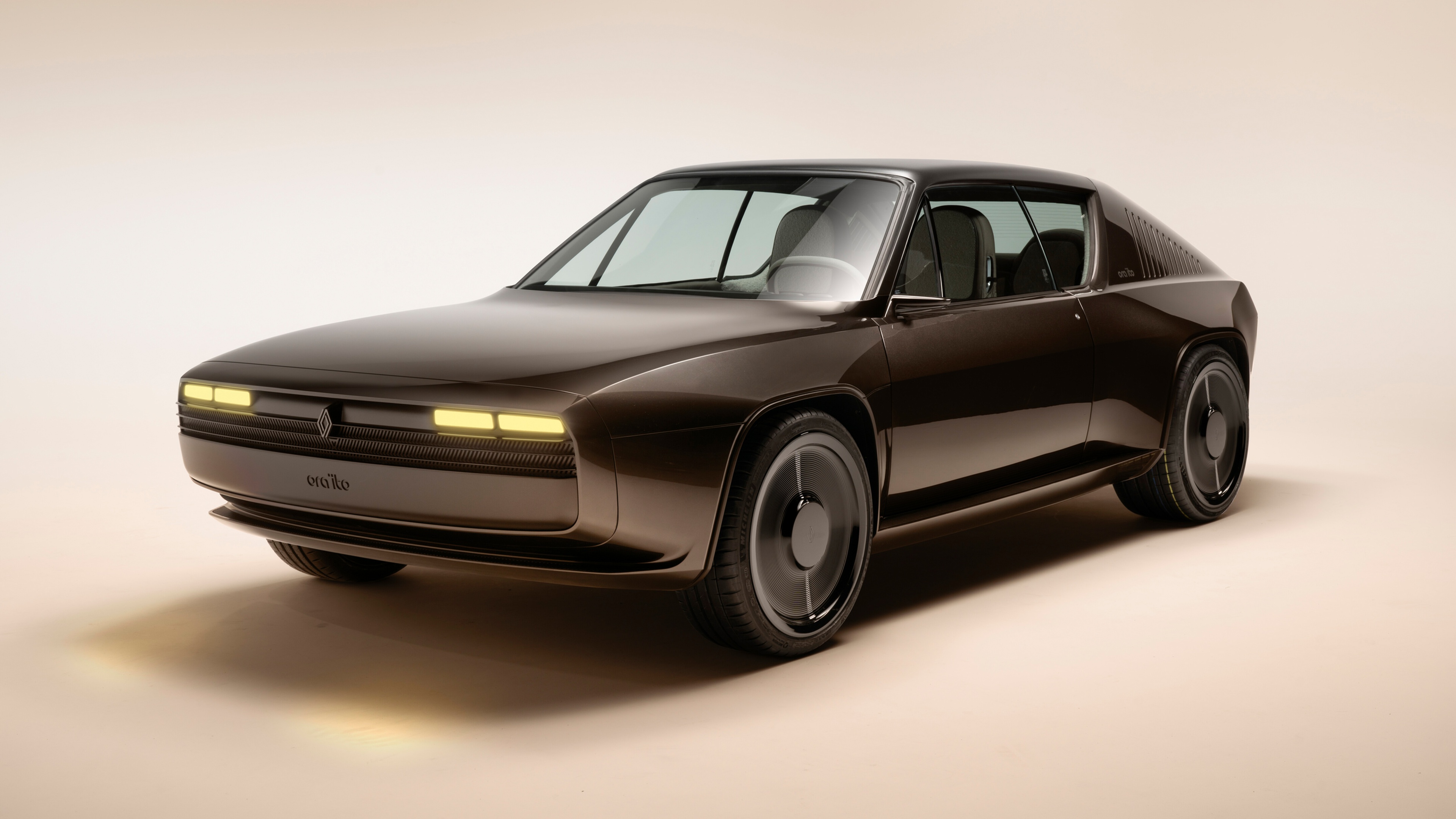A sleek and futuristic Renault electric concept car with advanced aerodynamic features.