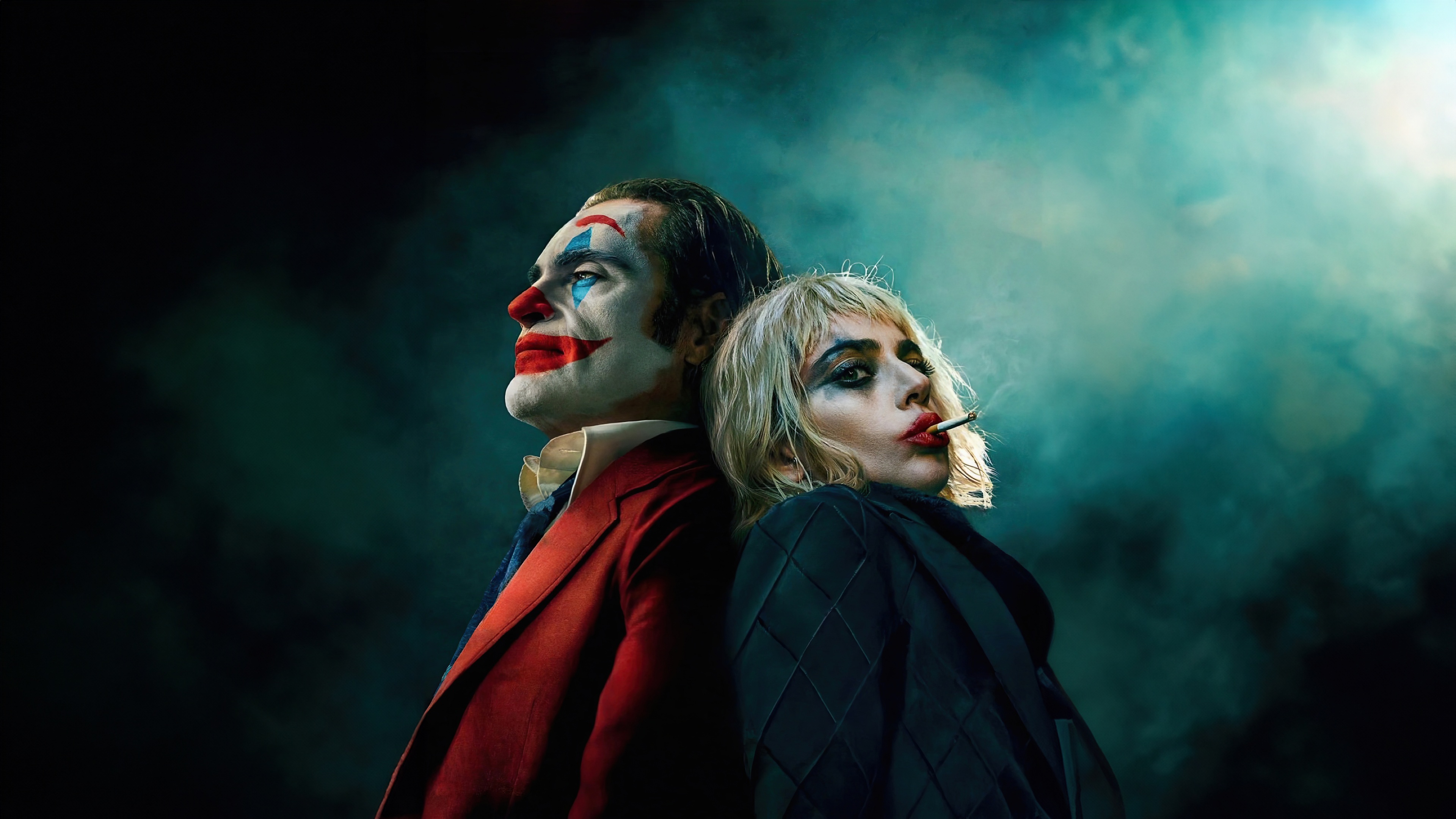 Cinematic portrait of Joaquin Phoenix as Joker and Lady Gaga as Harley Quinn from the movie Joker: Folie à Deux.