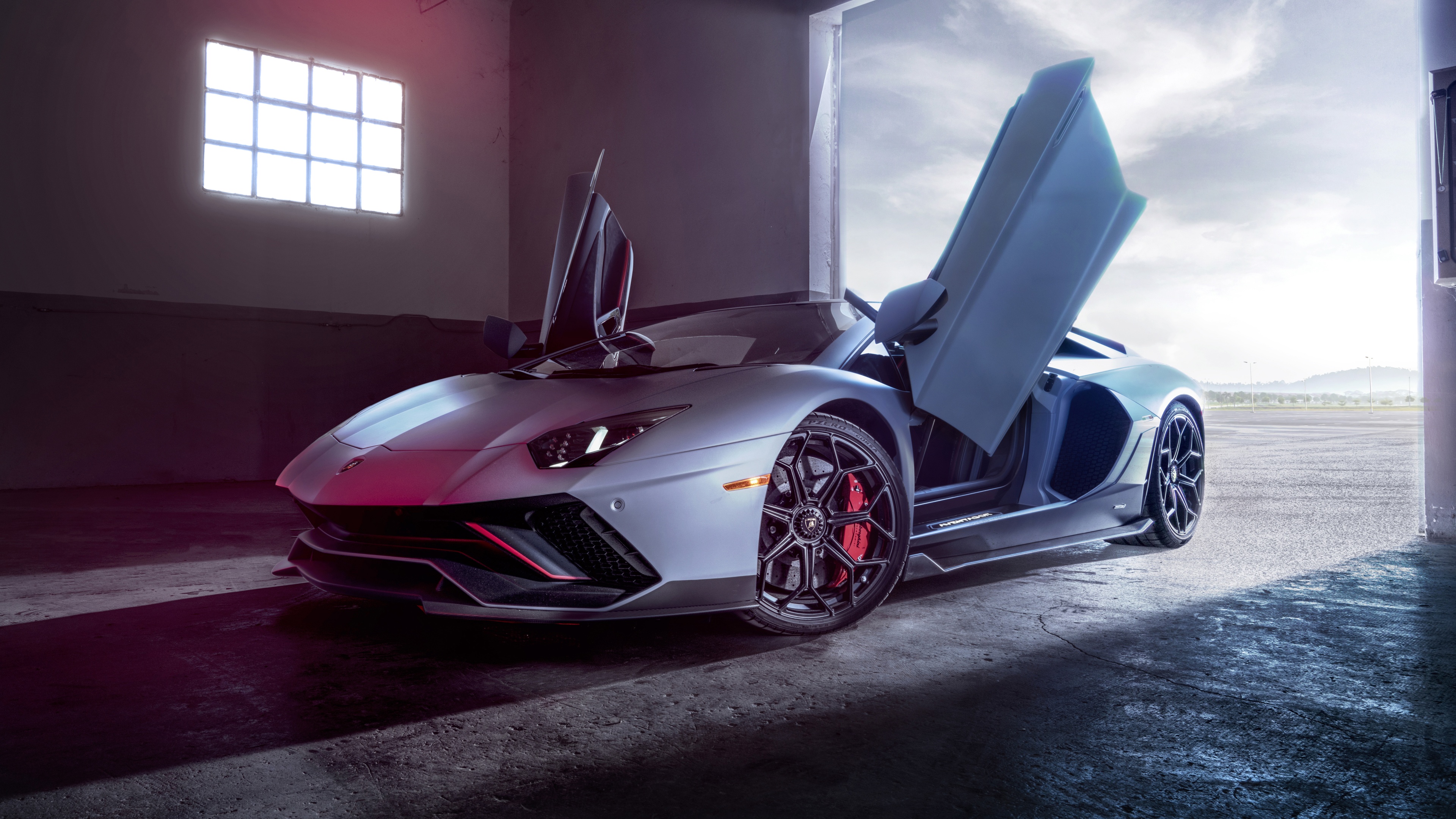 High-resolution close-up of a Lamborghini Aventador LP 780-4 Ultimae supercar showcasing its aerodynamic design and sleek bodywork.