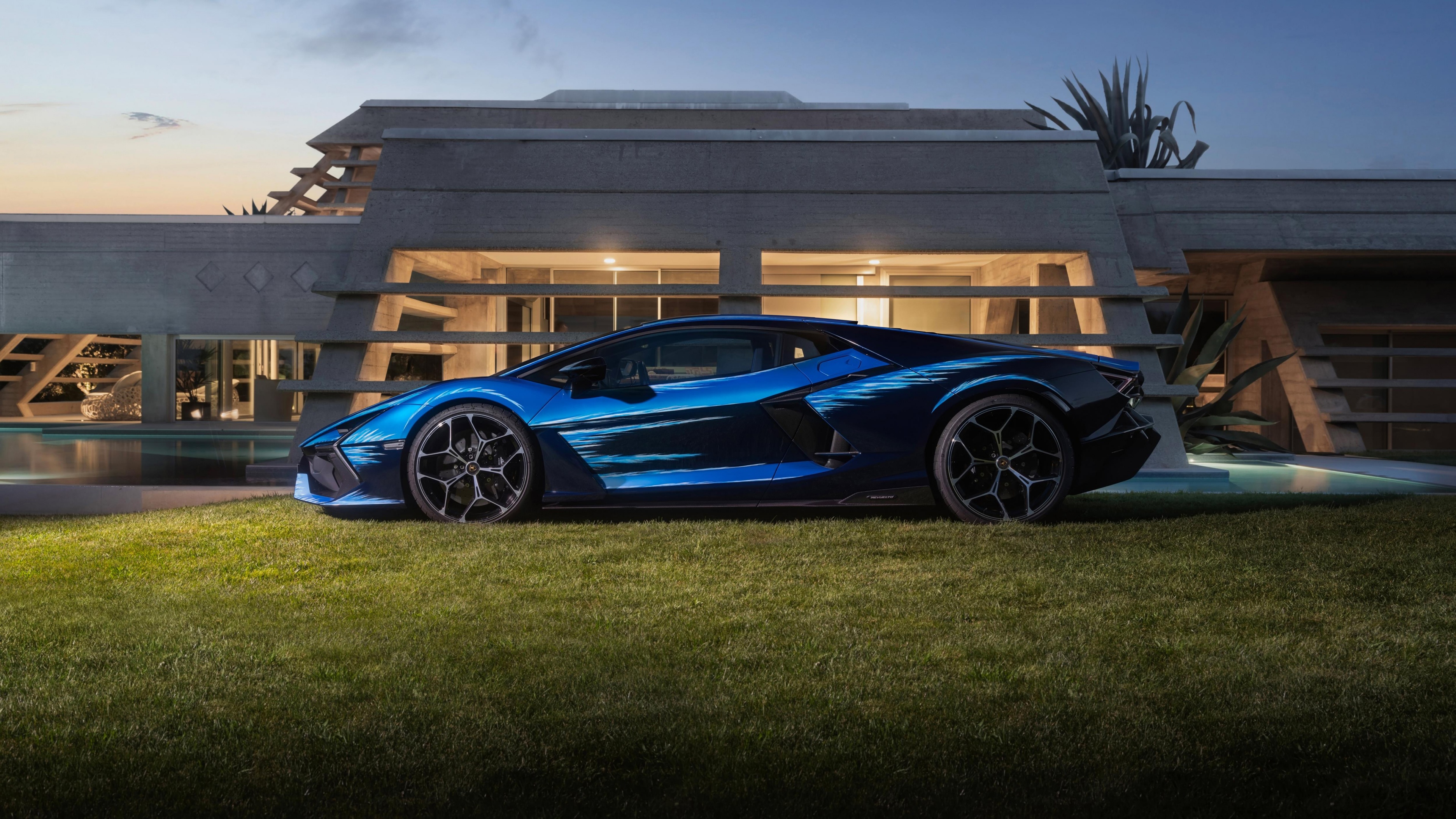 A high-detail, aesthetic view of the Lamborghini Revuelto Opera Unica supercar, showcasing its premium finish and modern automotive design.