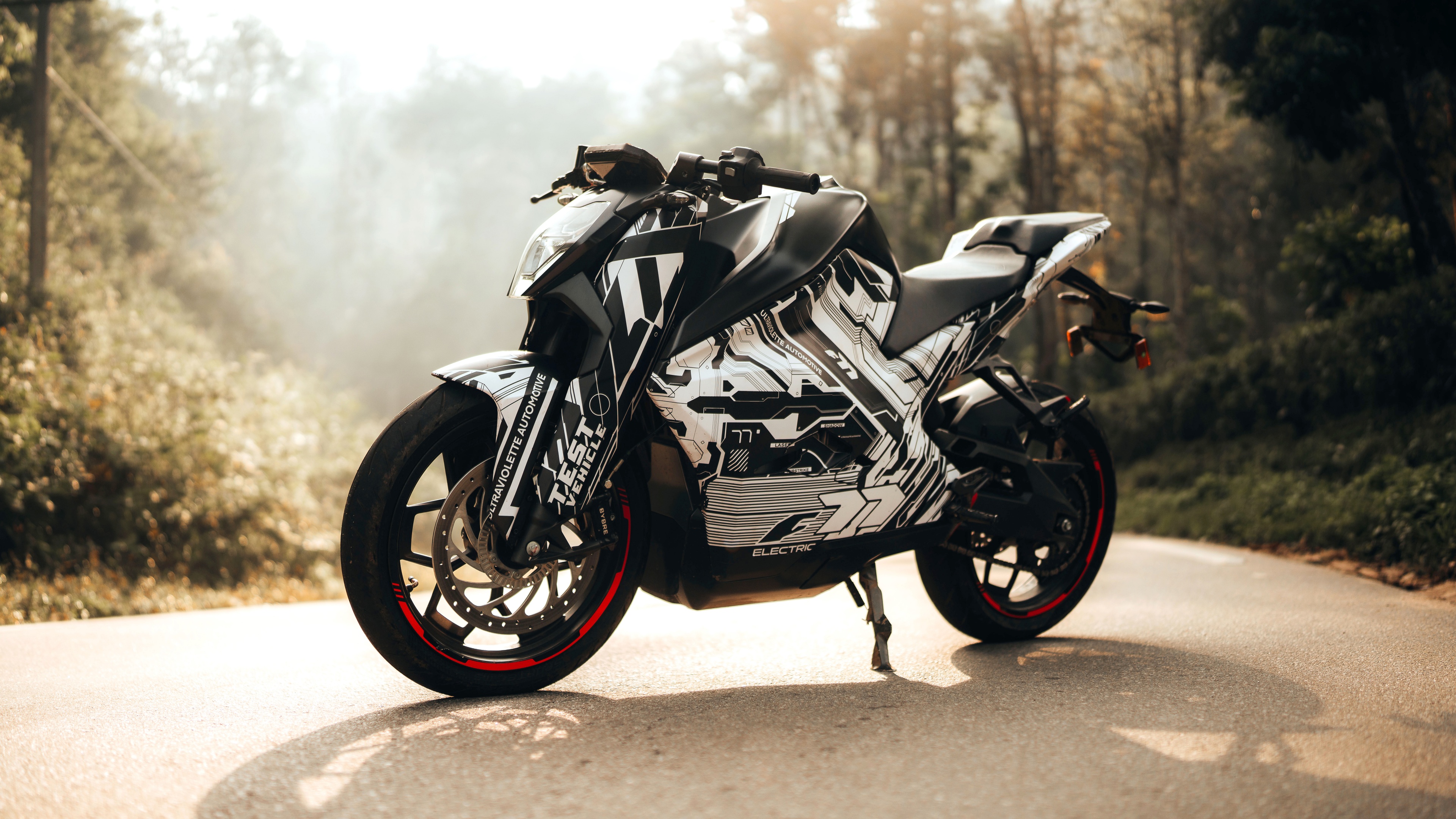 A detailed, high-definition view of the sleek Ultraviolette F77 electric sports motorcycle.