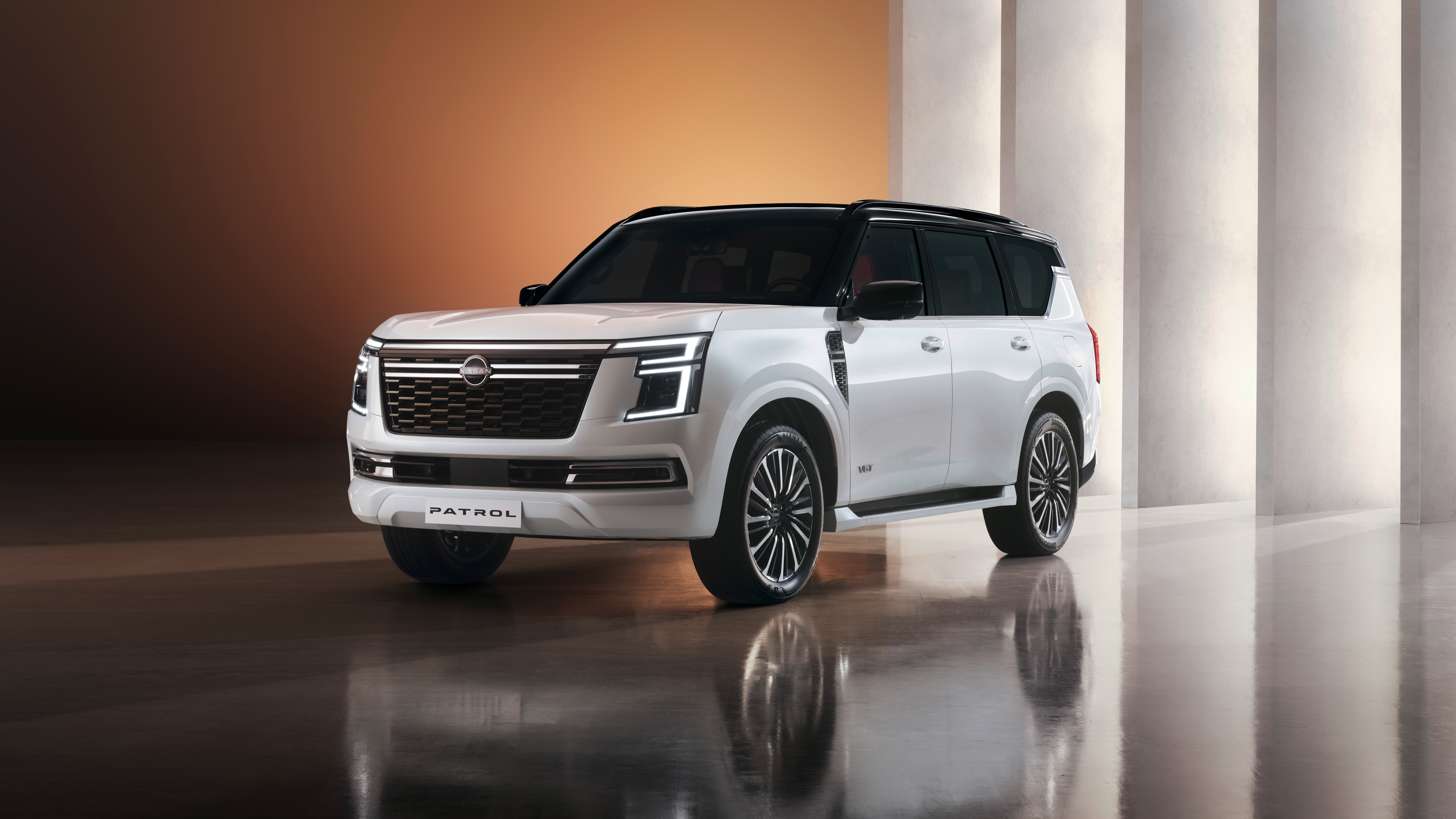 A sleek and modern 2024 luxury SUV with a polished metallic exterior and high-end design features.