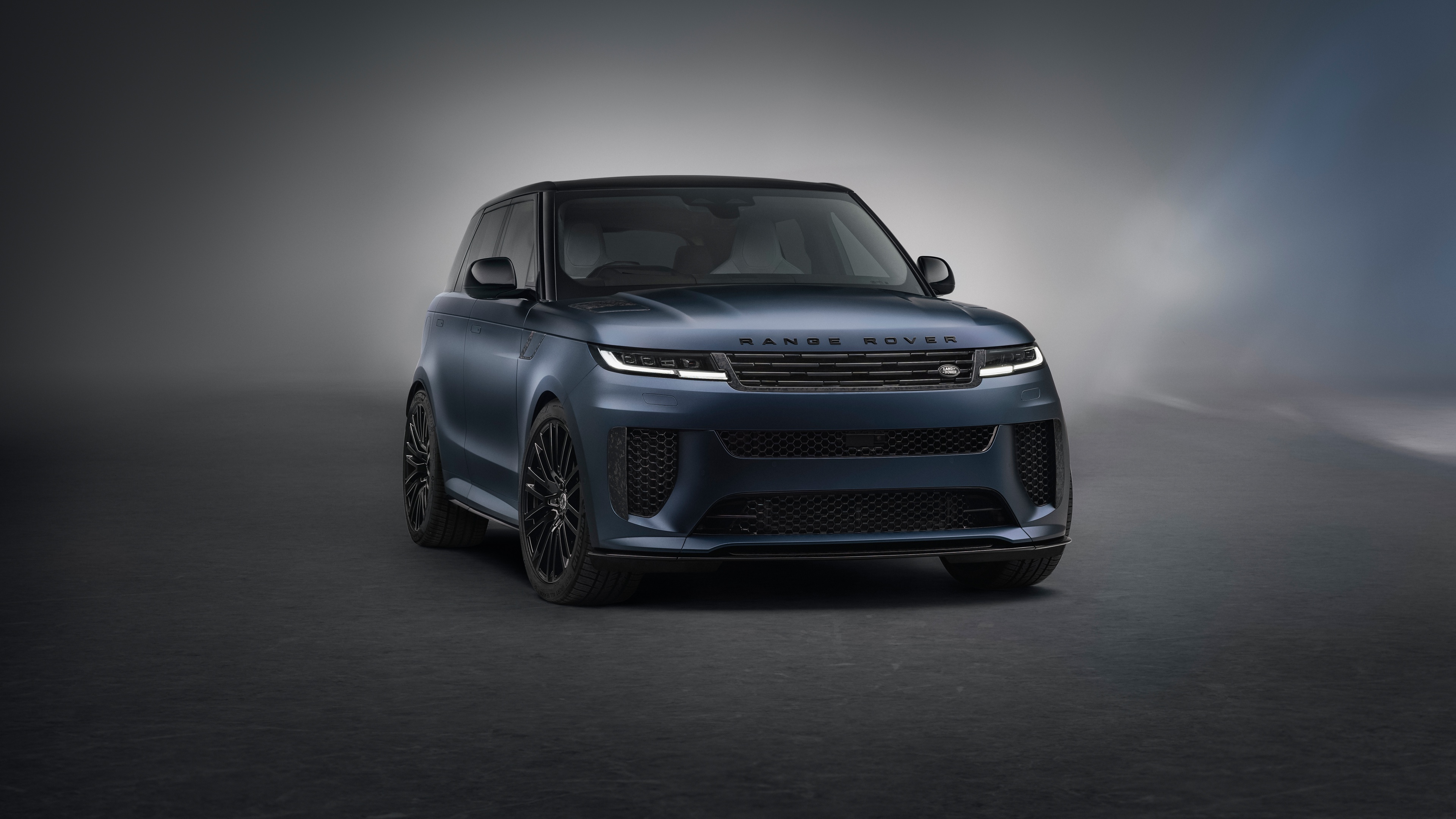 A sleek and powerful 2024 Range Rover Sport SV luxury SUV in high resolution.