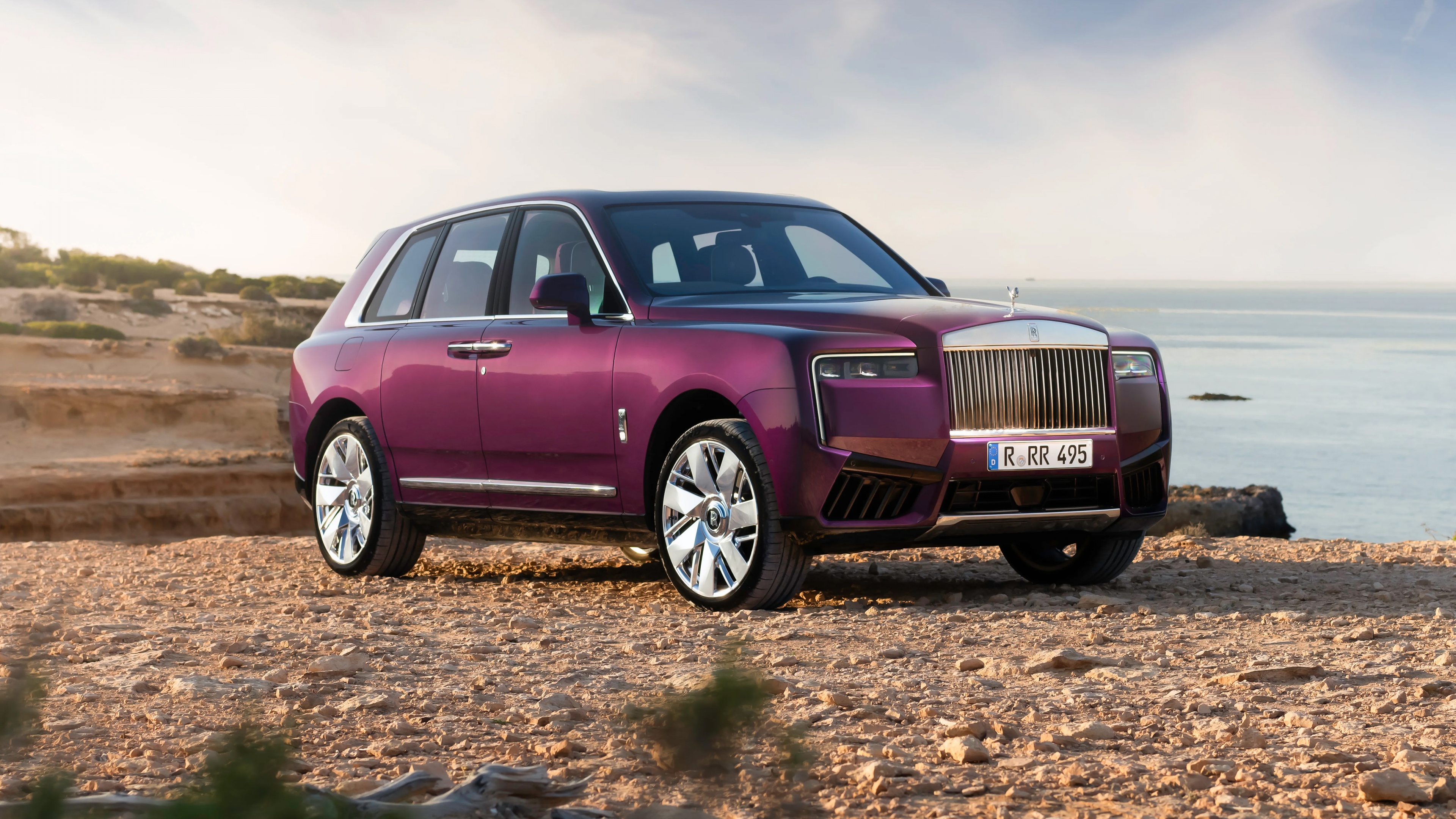 A detailed, high-resolution shot of a 2024 Rolls-Royce Cullinan luxury SUV.