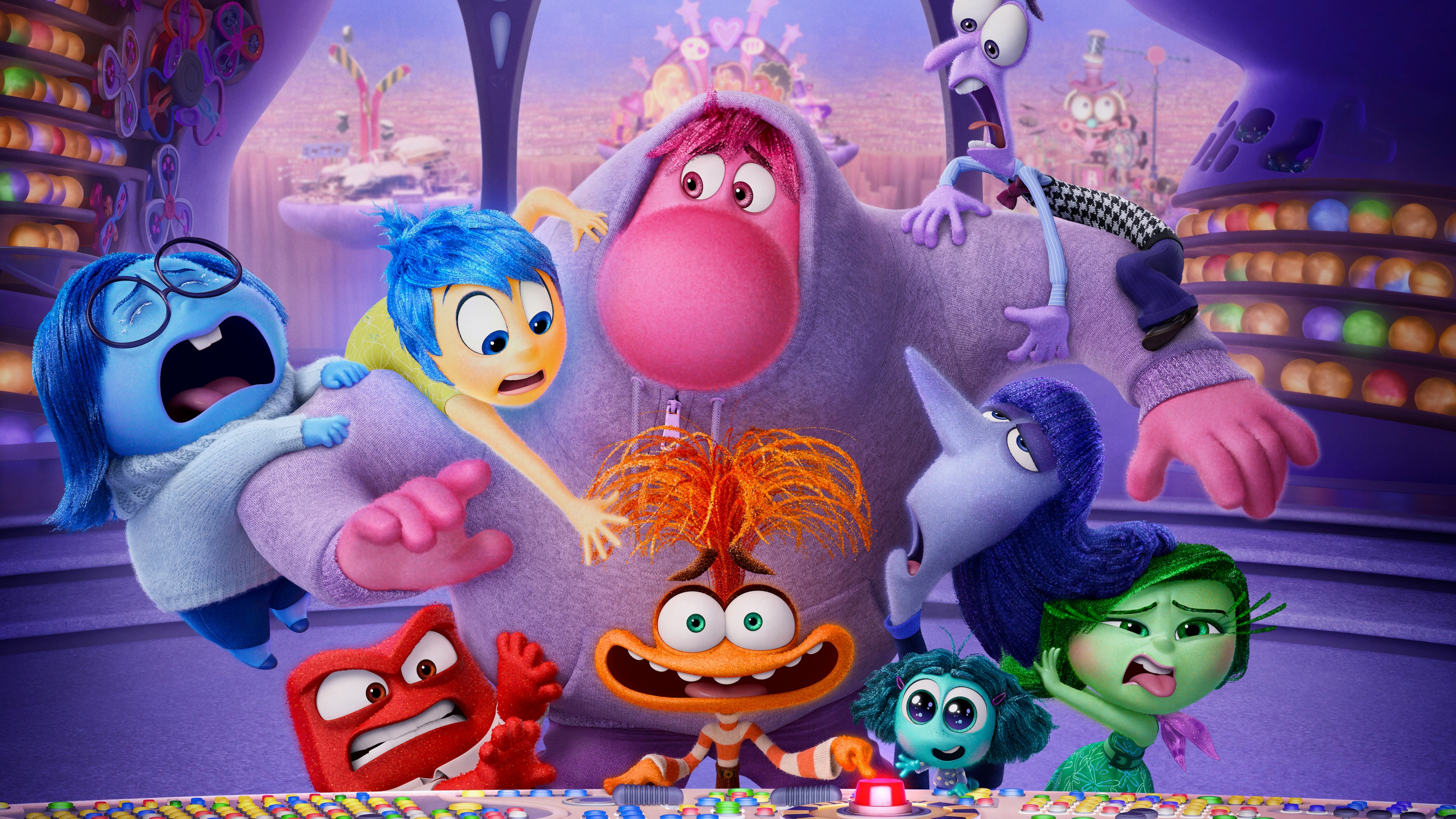 A colorful group of animated characters including Joy, Sadness, Anger, Fear, Disgust, Anxiety, Embarrassment, and Envy from Pixar's Inside Out 2.