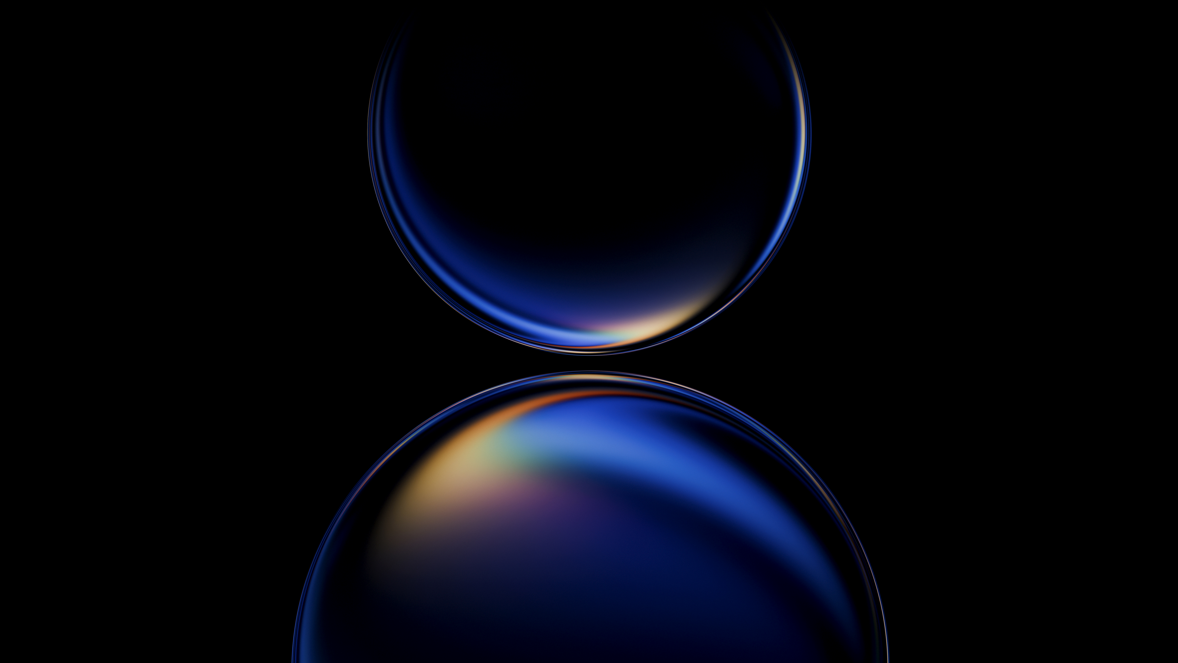 A macro view of iridescent blue flowing textures with shimmering light on a dark background.