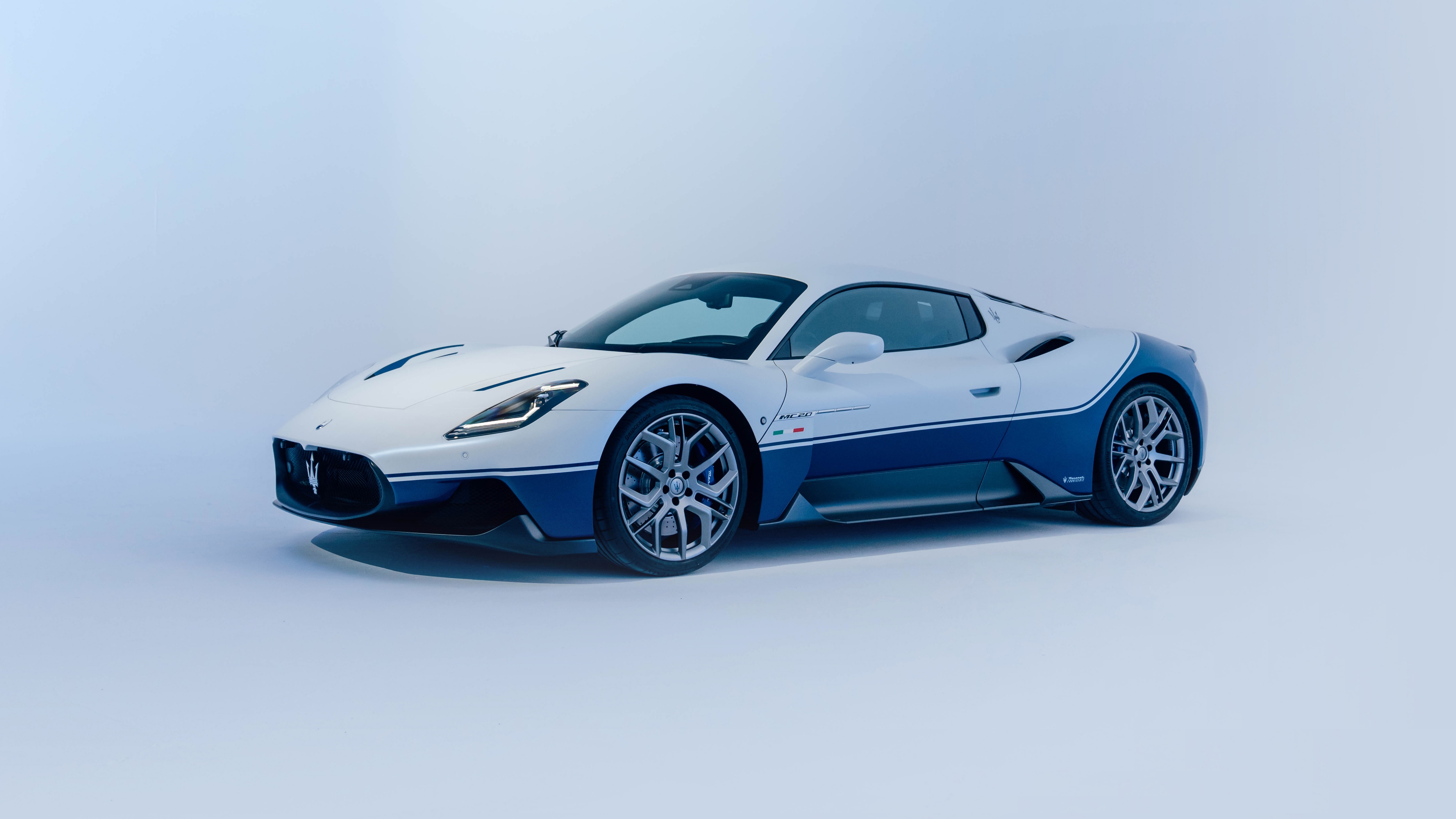 A detailed, high-resolution view of a 2024 Maserati MC20 luxury supercar.