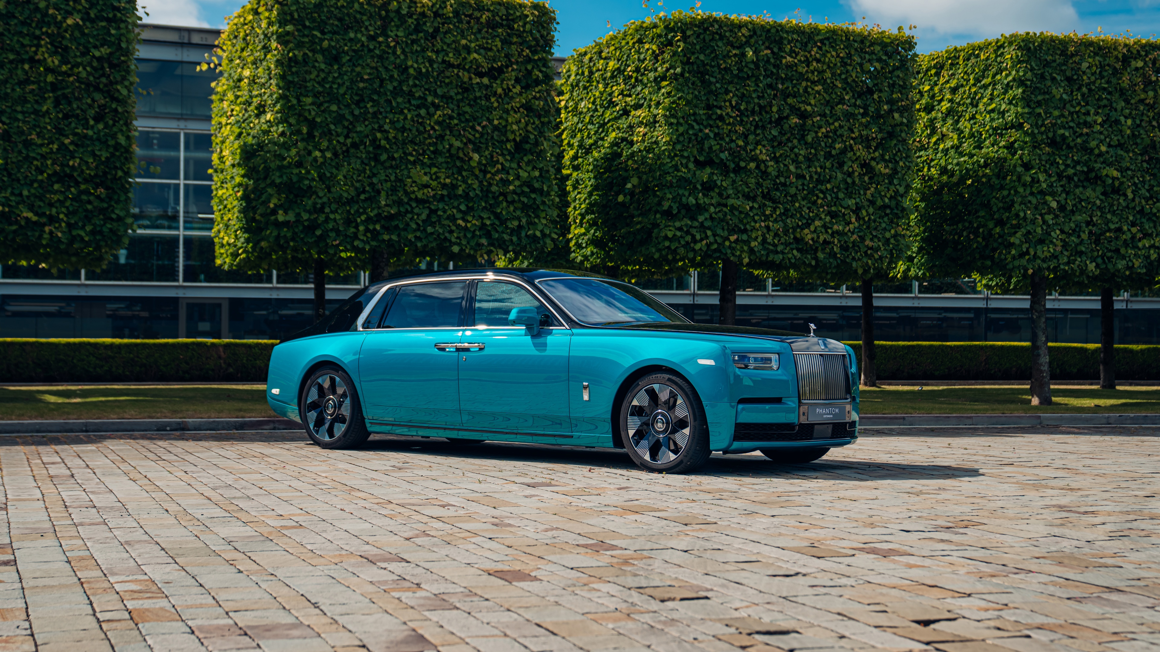 A high-resolution, detailed close-up of a 2024 Rolls-Royce Phantom Extended luxury car.