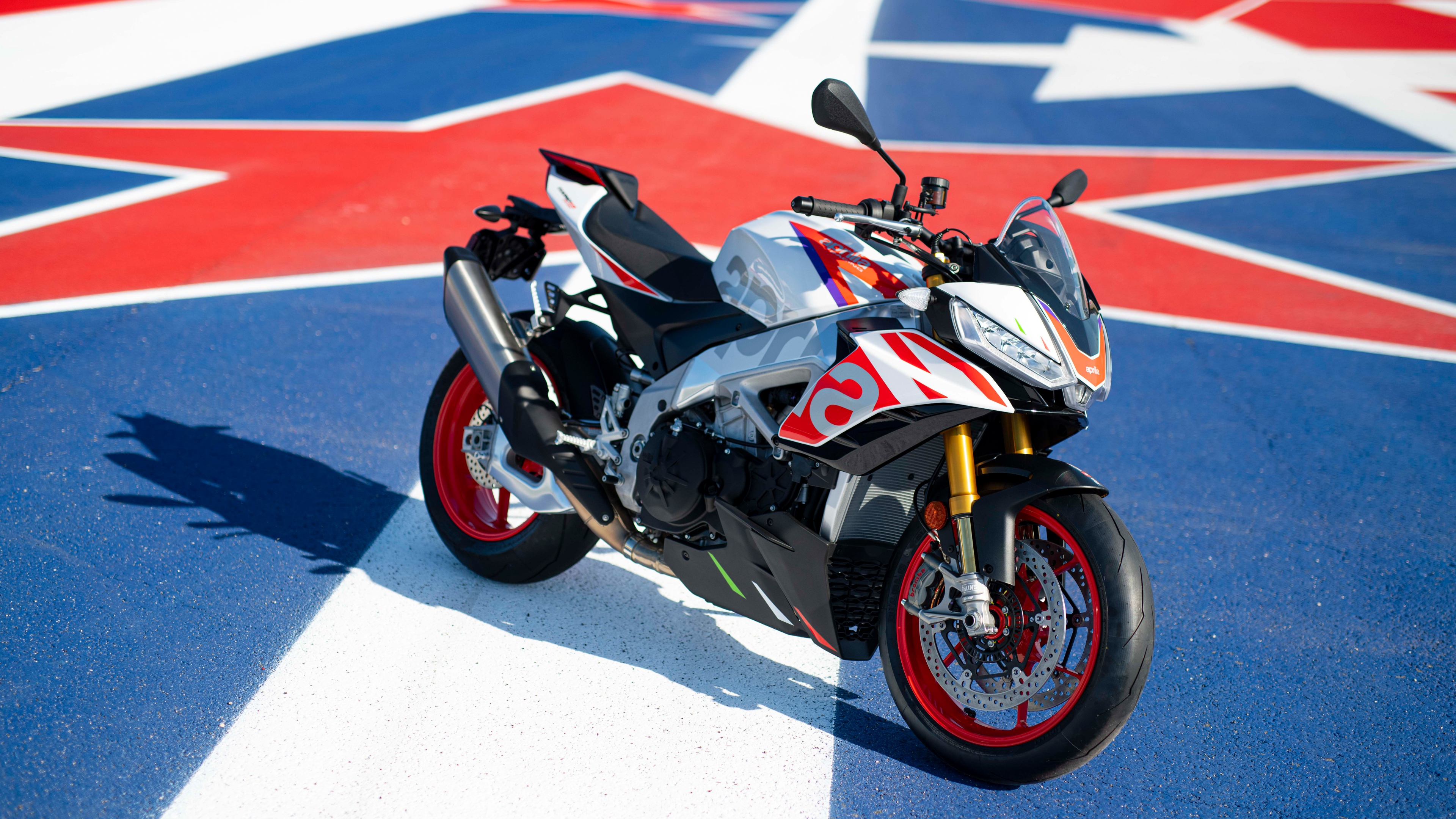 A high-resolution, detailed close-up of an Italian Aprilia Tuono V4 Factory limited edition superbike.