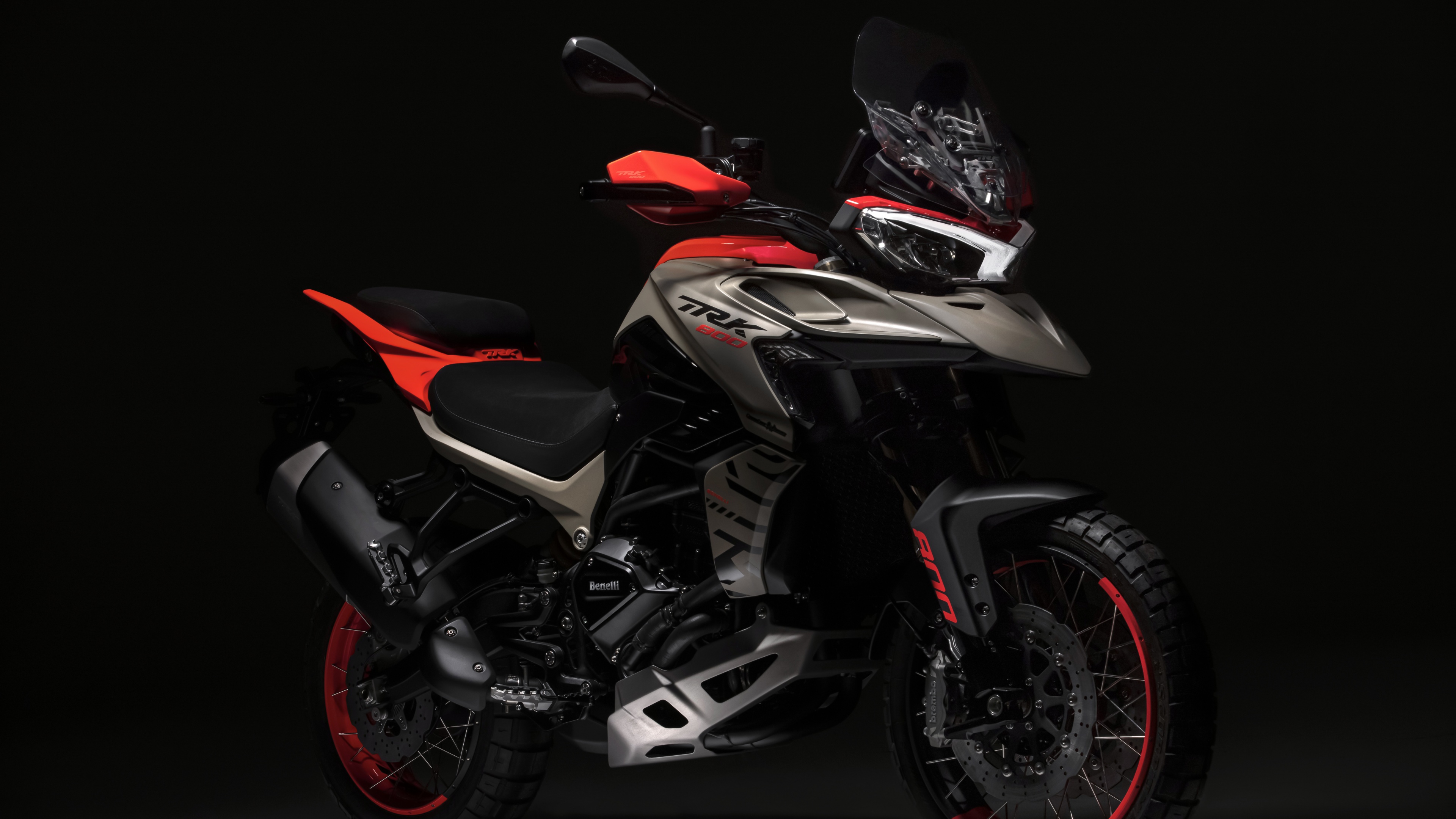 A high-resolution close-up of a 2022 Benelli TRK 800 adventure motorcycle against a solid black background.