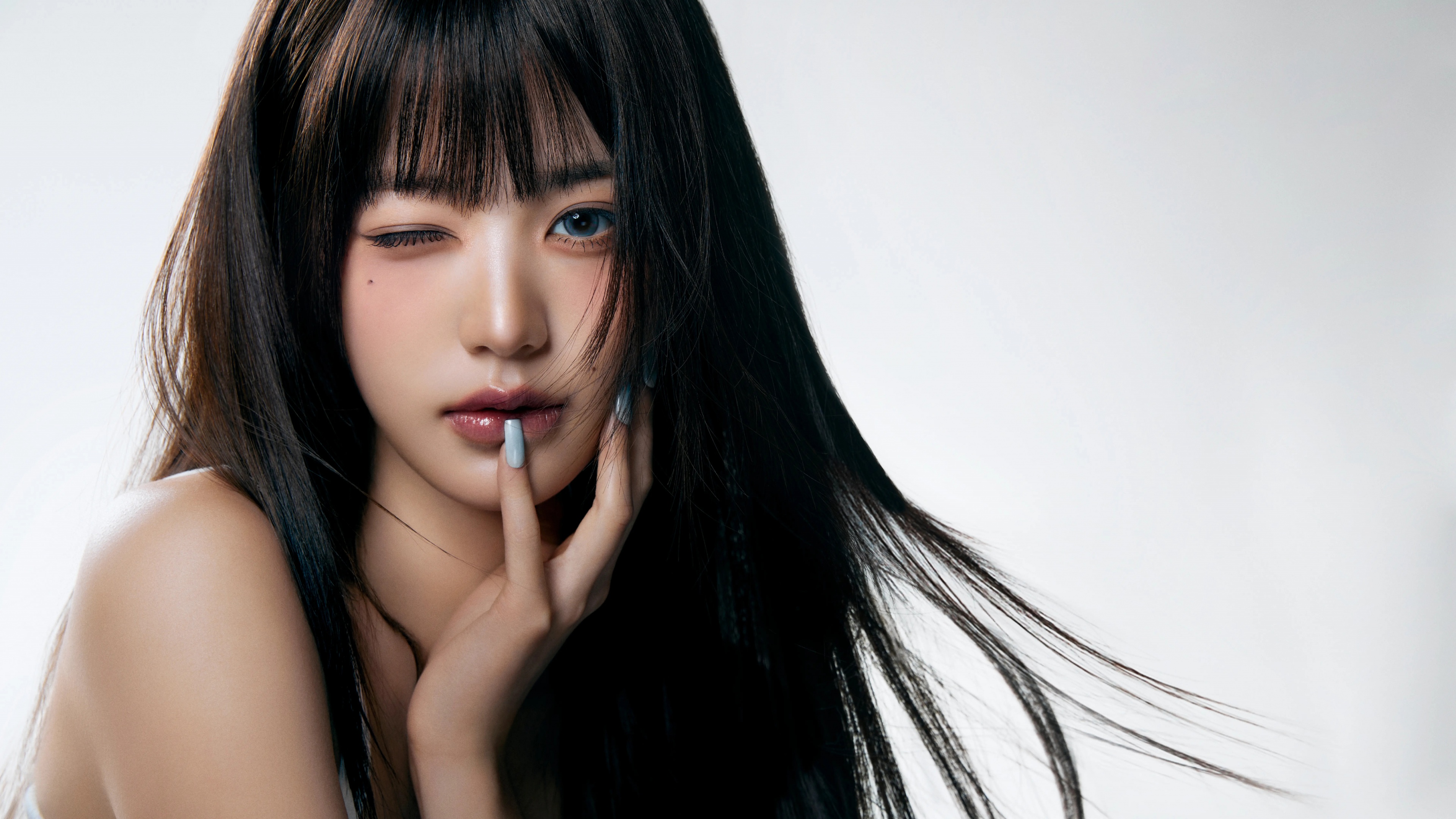 A high-definition portrait of K-pop singer Jang Wonyoung against a minimalist white background.