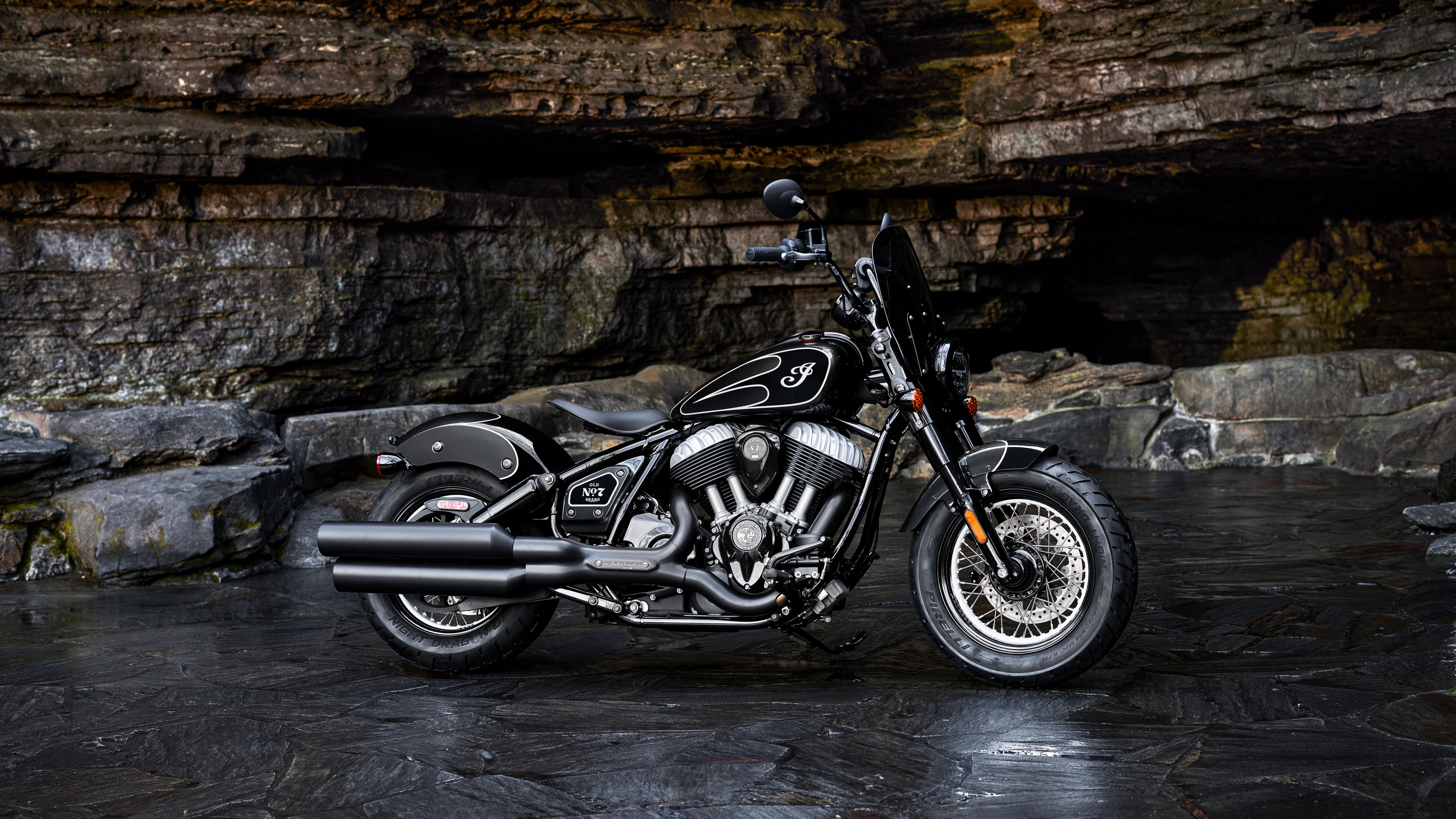 Detailed view of a 2023 Indian brand cruiser motorcycle featuring prominent chrome finishes and a heavy-duty frame.
