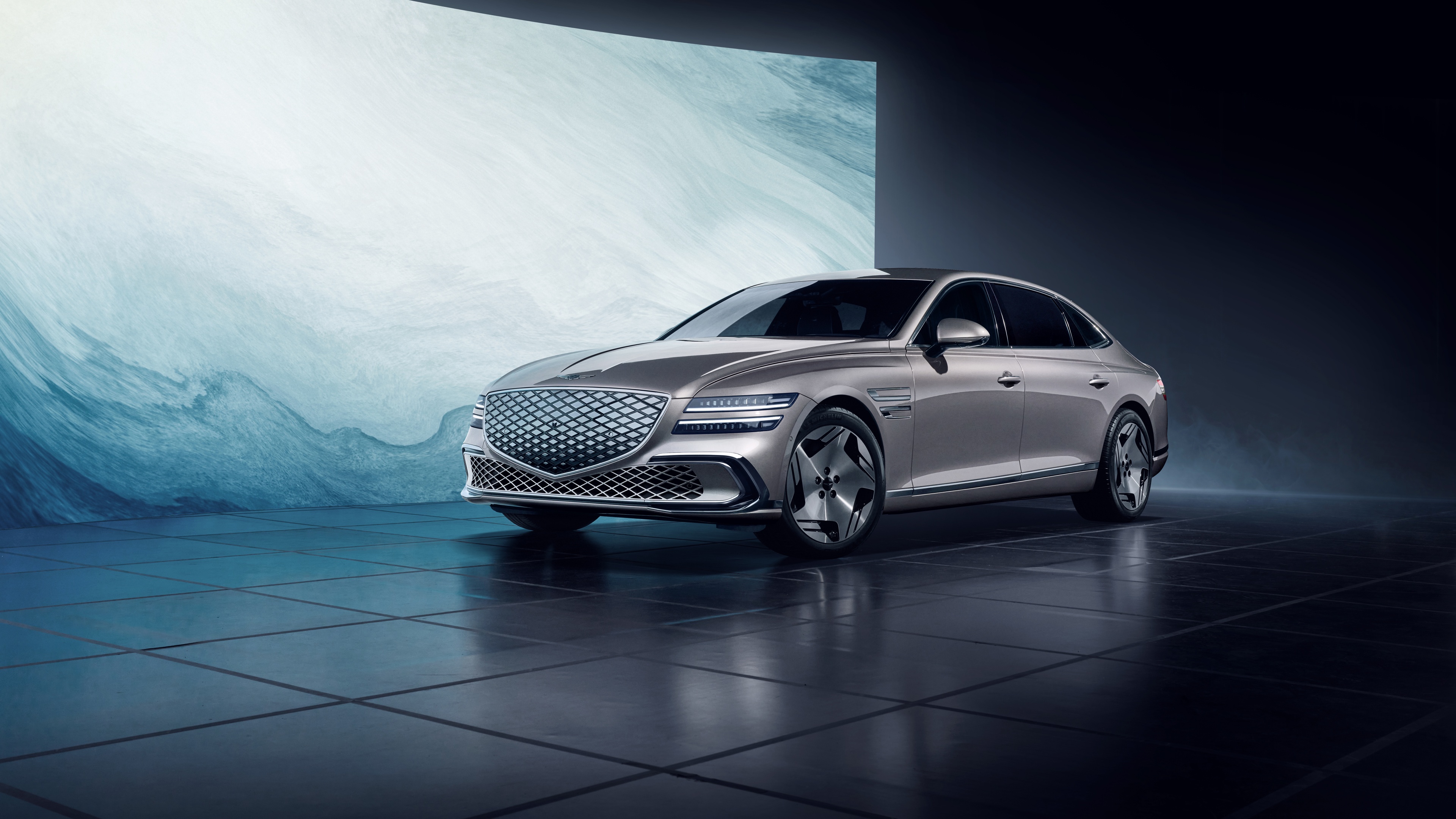A high-resolution, detailed view of the 2024 Genesis Electrified G80 electric sedan in a premium setting.