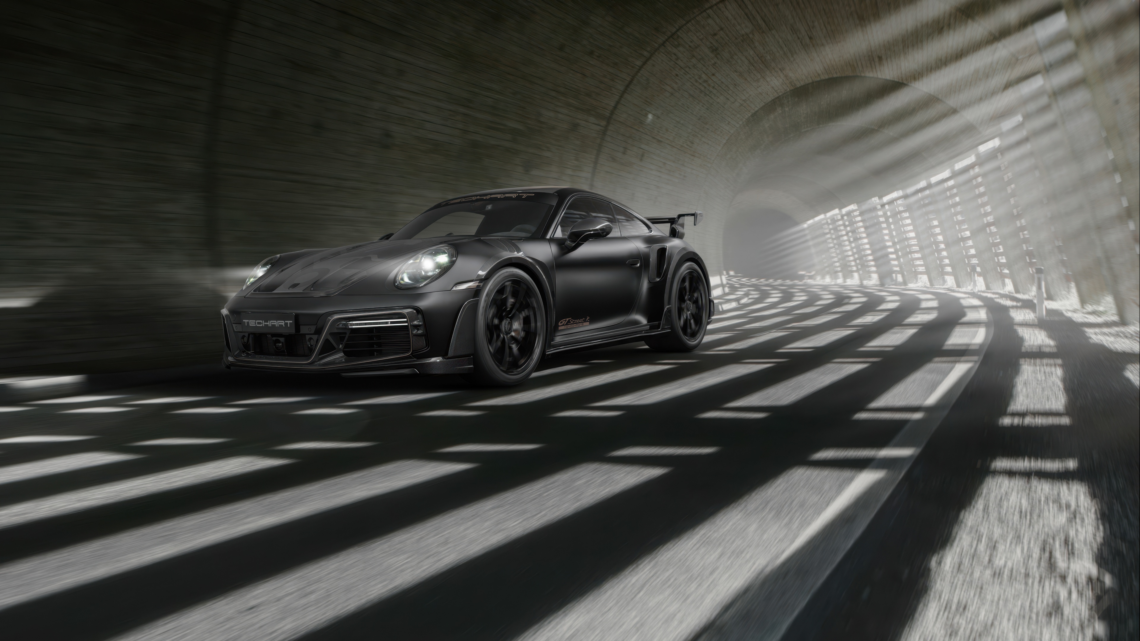 A high-detail, professional shot of a 2024 Porsche 911 Turbo S featuring its iconic silhouette and modern aesthetic.