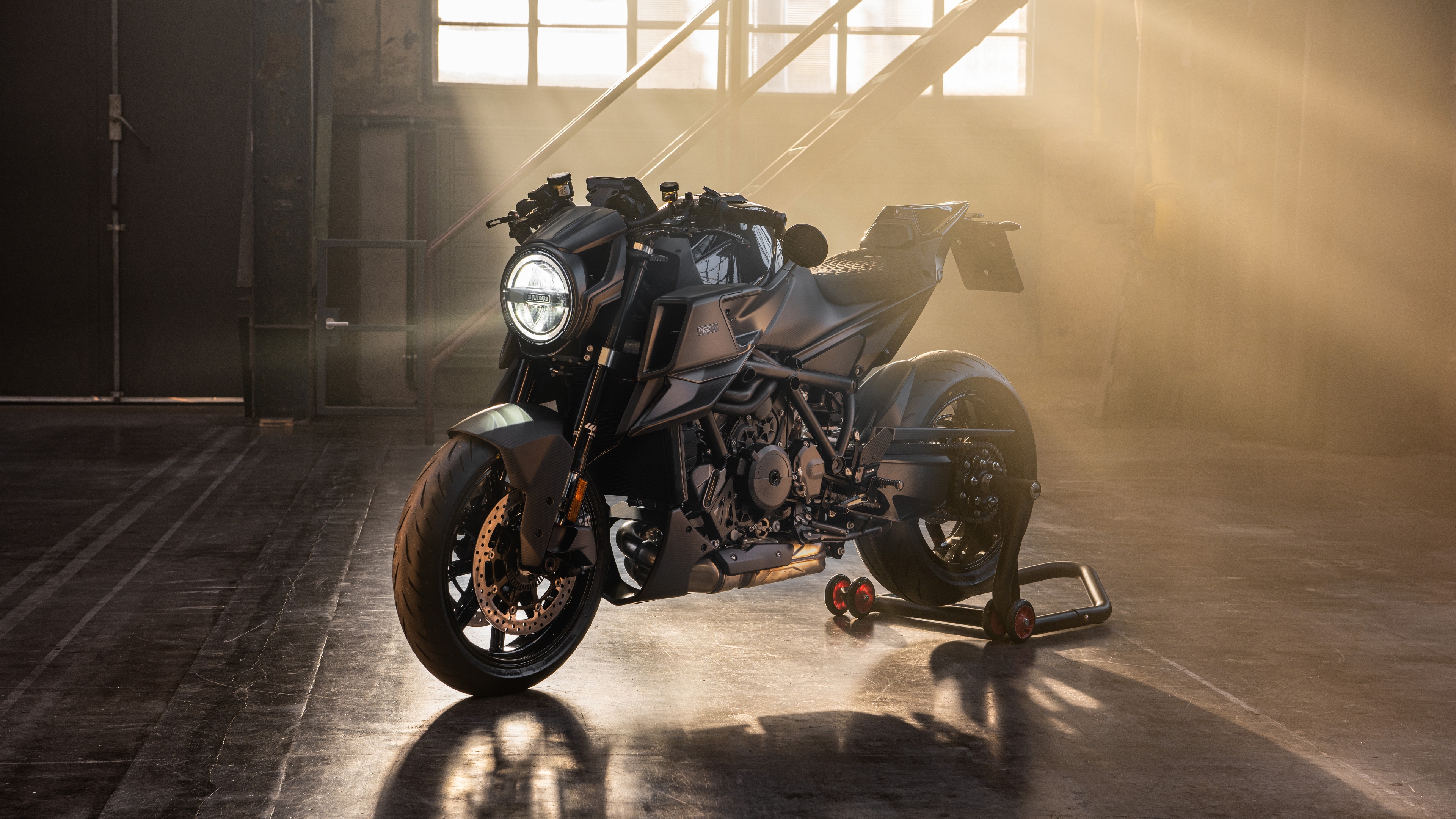 A high-resolution view of a Brabus 1300 R Edition SUV and a KTM 1290 Super Duke R EVO motorcycle.