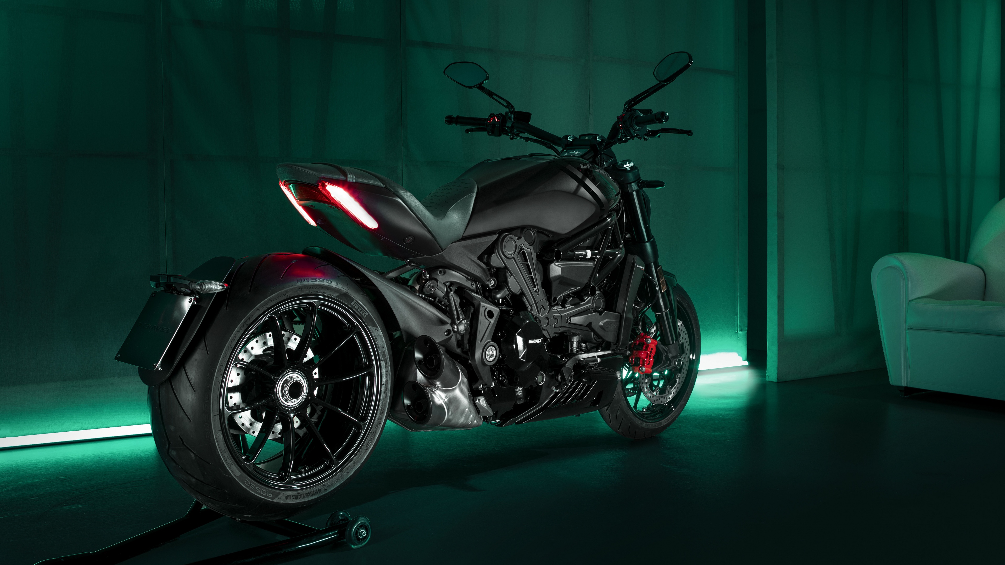 A detailed close-up of the black Ducati XDiavel Nera 2022 limited edition sports cruiser motorcycle.