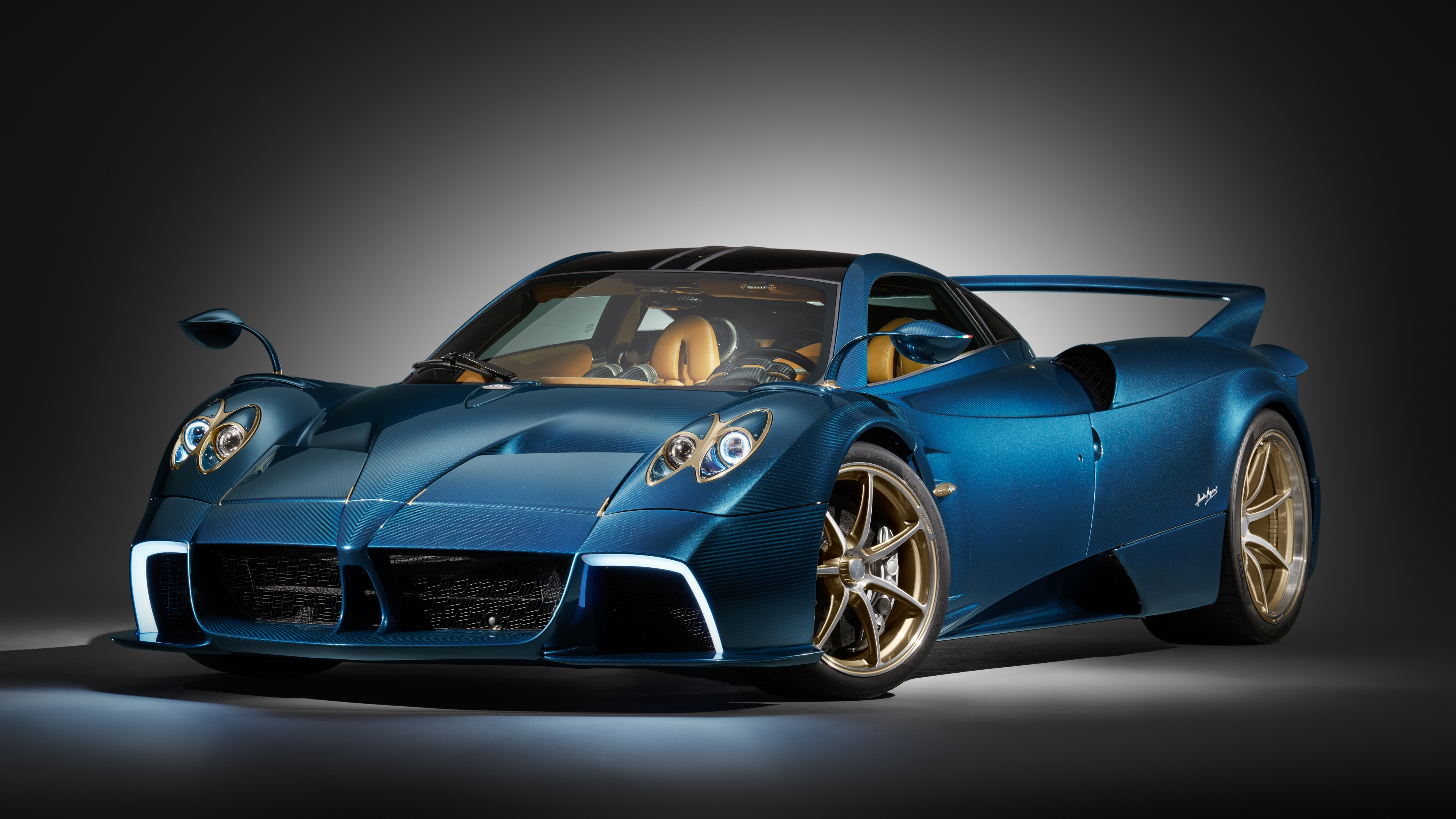 A sleek, aerodynamic hypercar with a modern design and metallic finish, representing the 2024 automotive future.