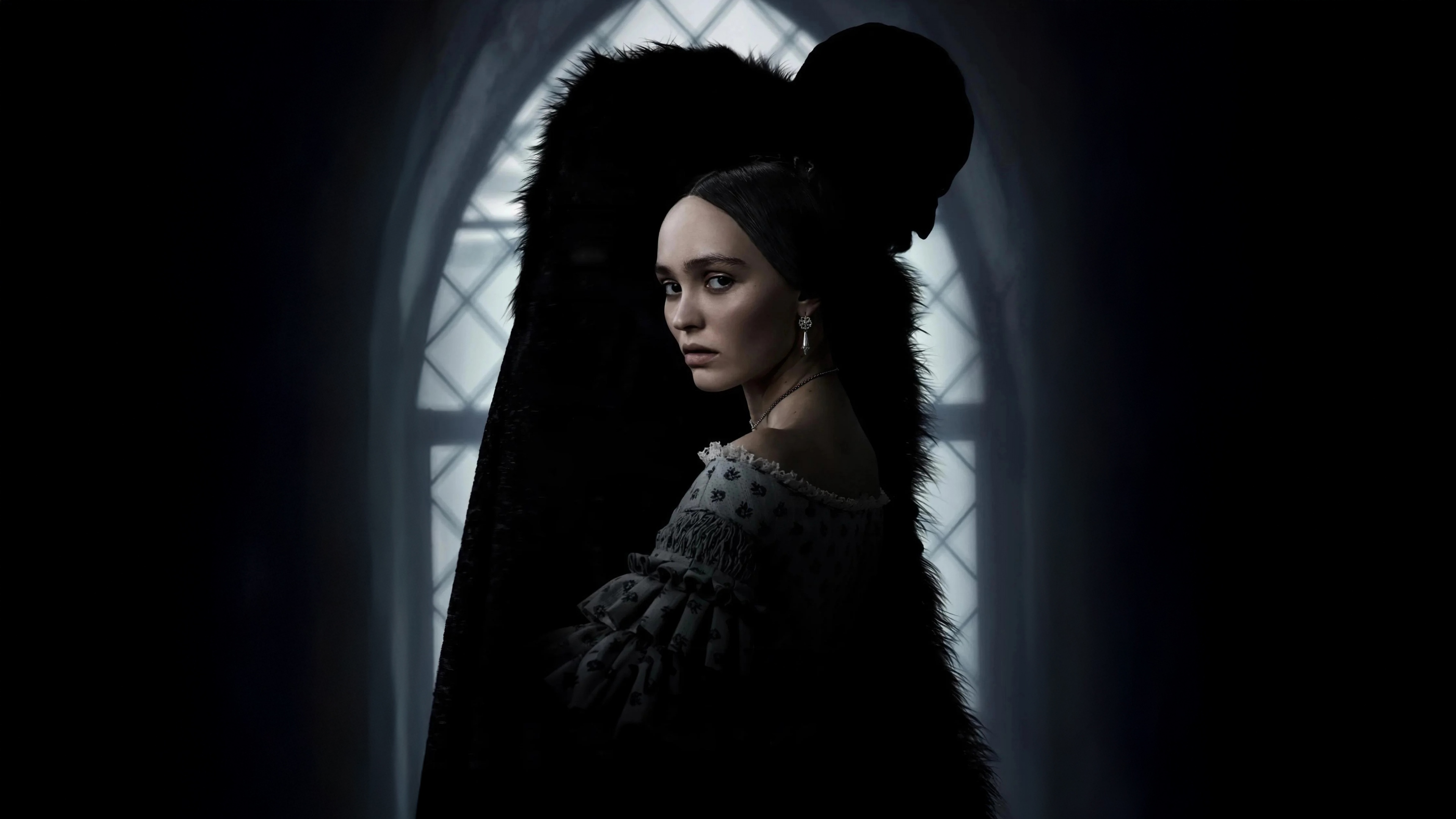 A dark and cinematic horror portrait of Lily Rose Depp styled as the vampire character from Nosferatu.