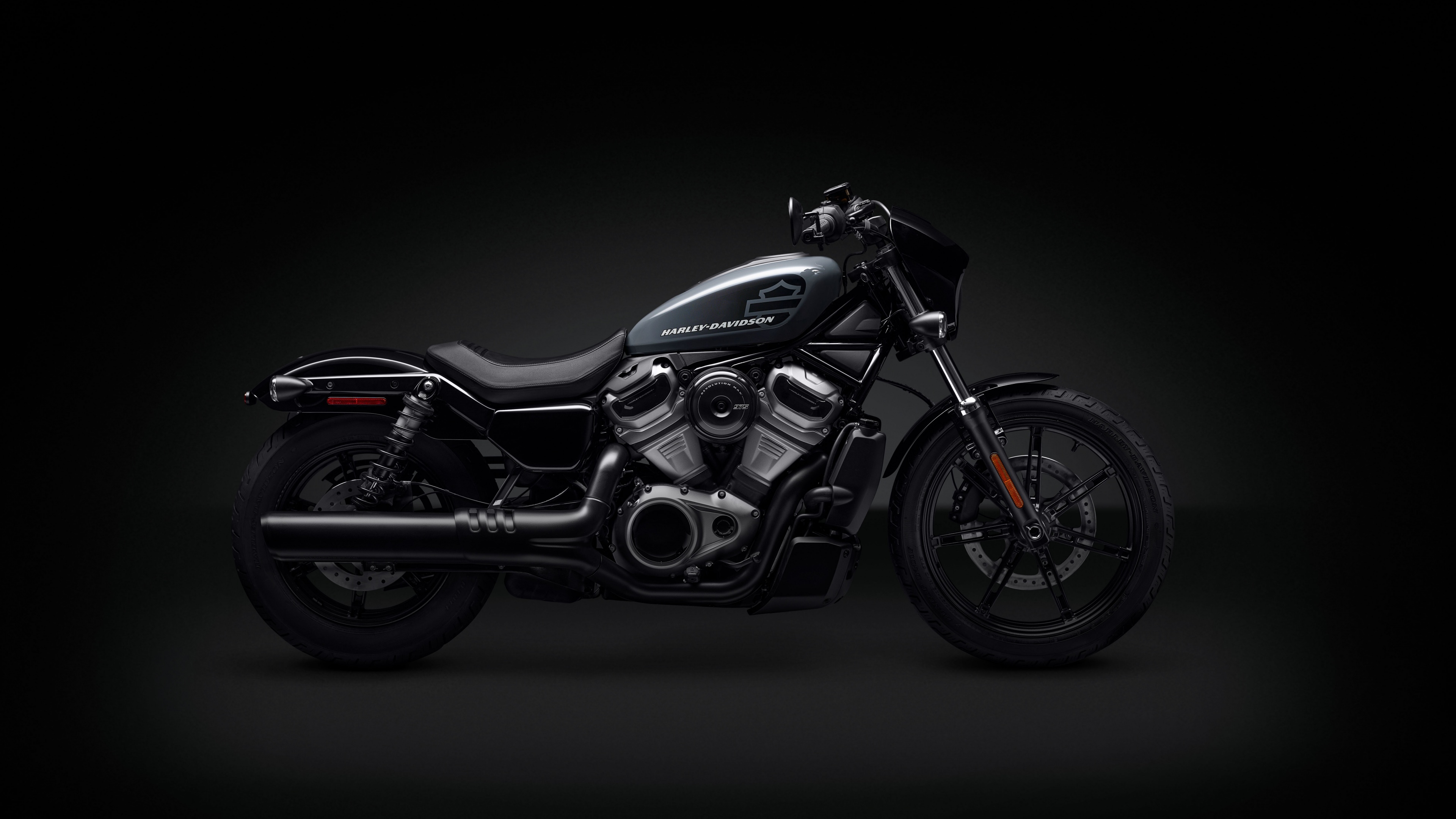 A high-detail, professional photograph of a 2022 Harley-Davidson Nightster cruiser motorcycle.