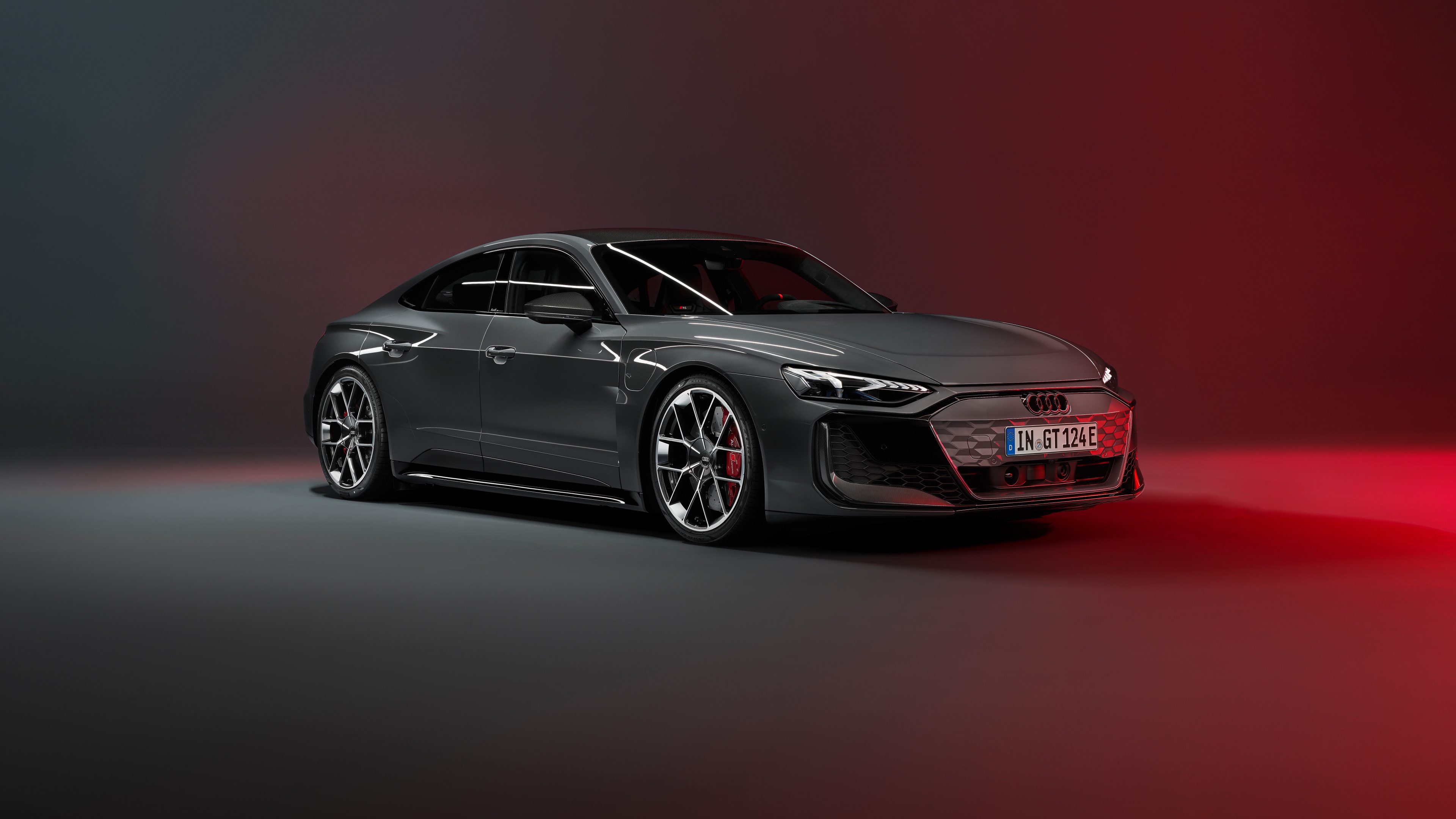 A sleek and modern 2024 Audi RS e-tron GT luxury electric car shown in high detail.