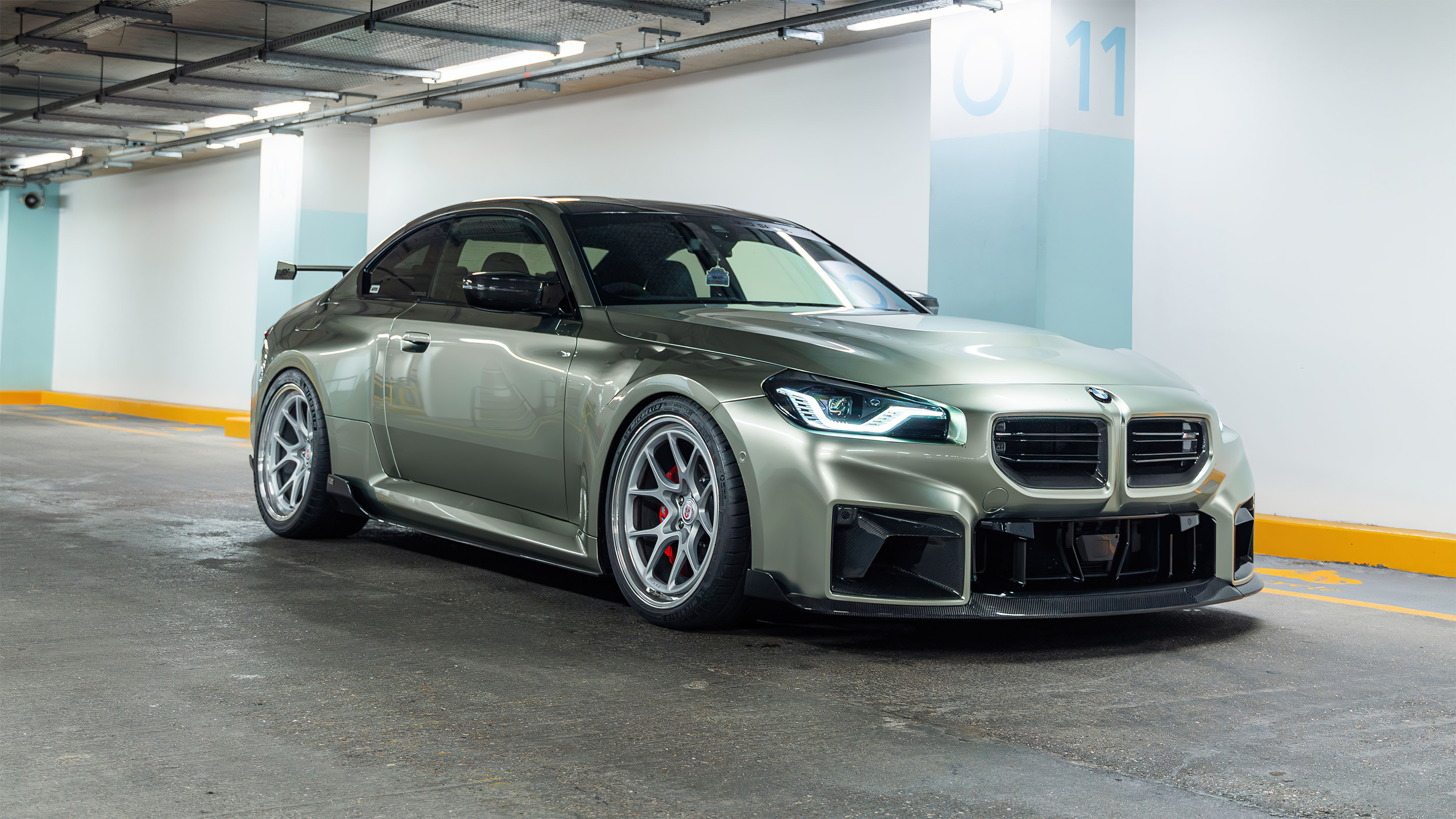 A sleek and modern 2024 BMW M2 sports car displayed in a high-resolution professional shot.