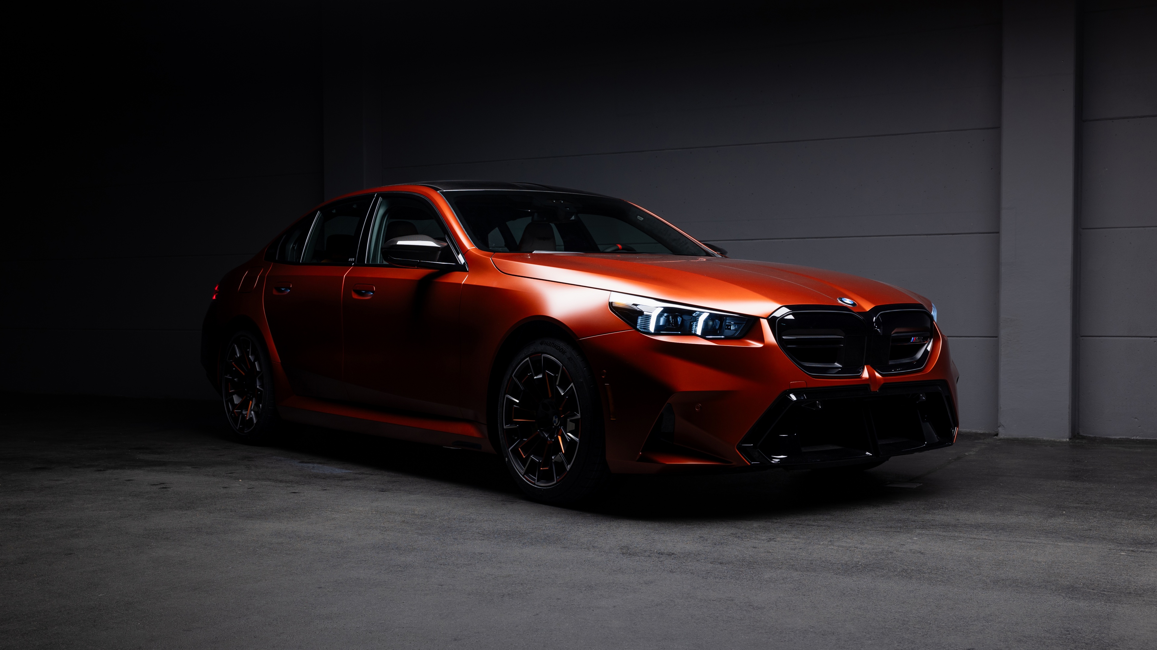 A high-resolution, detailed shot of the 2025 BMW M5 luxury performance sedan showcasing its modern design.