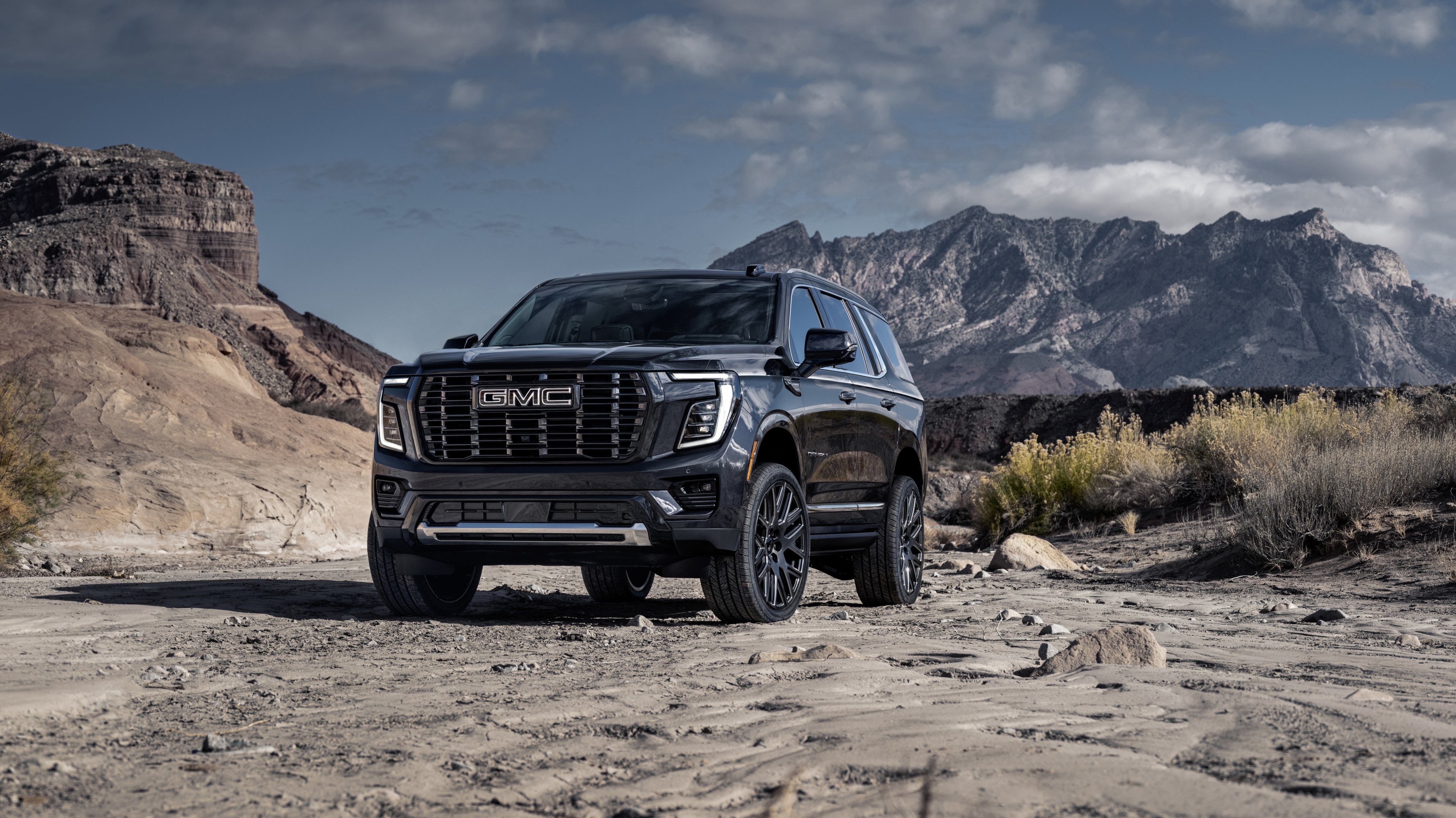 A detailed, high-quality view of the 2025 GMC Yukon Denali Ultimate luxury SUV.