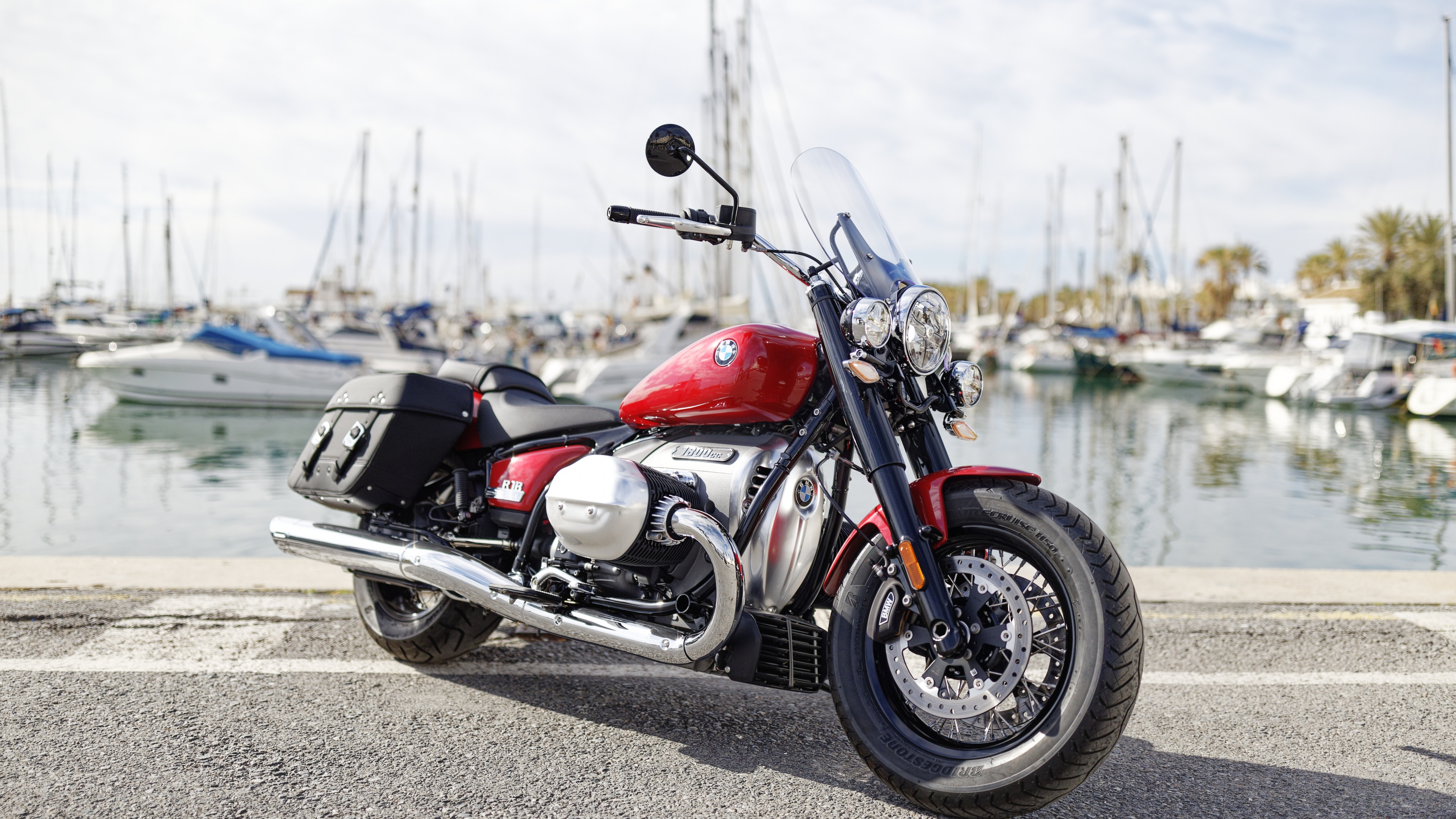 A detailed view of a 2022 BMW R 18 Classic motorcycle showcasing its chrome finishes and classic cruiser design.