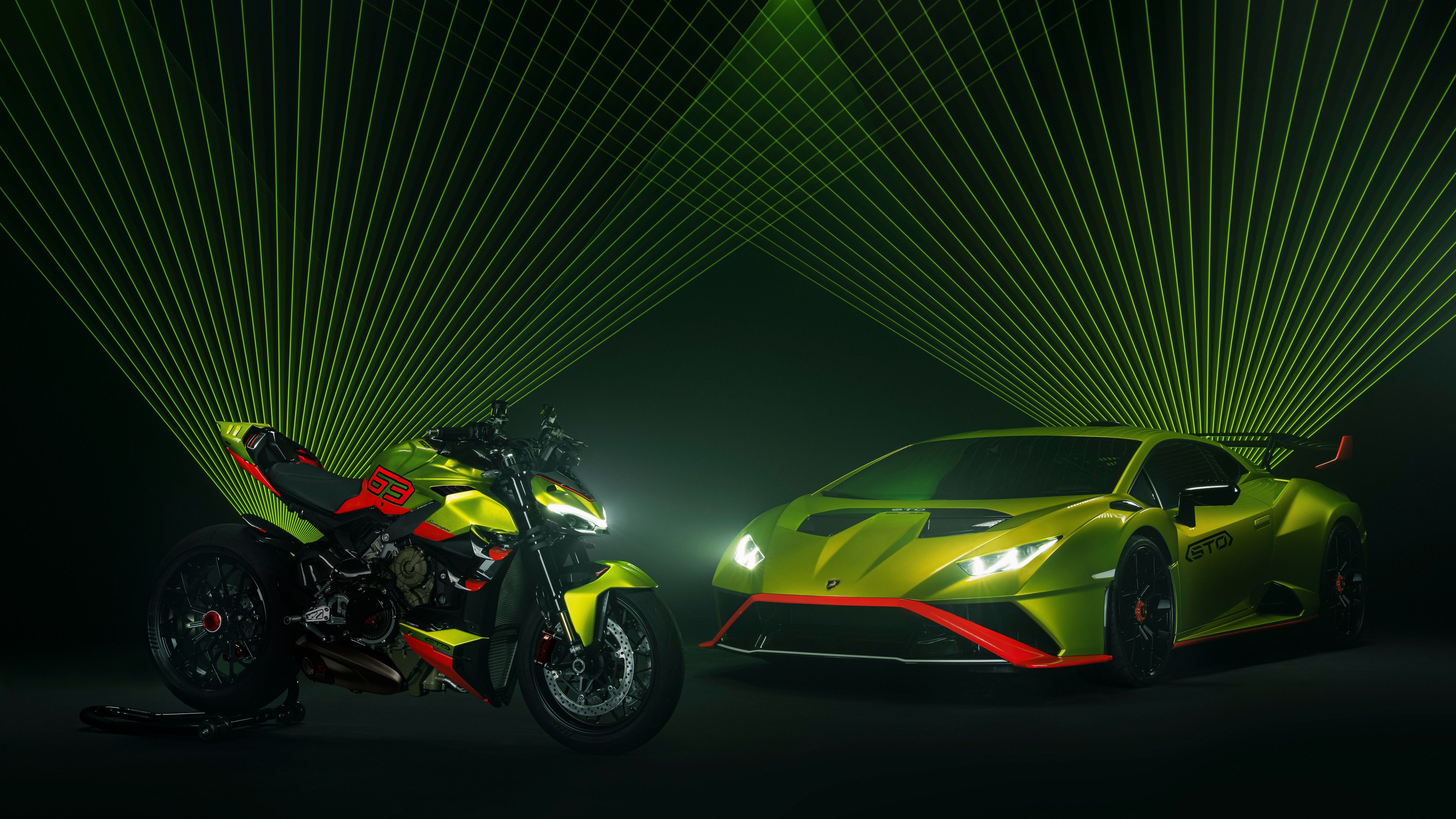 A high-resolution cinematic shot featuring a Lamborghini Huracán STO supercar and a Ducati Streetfighter V4 motorcycle.