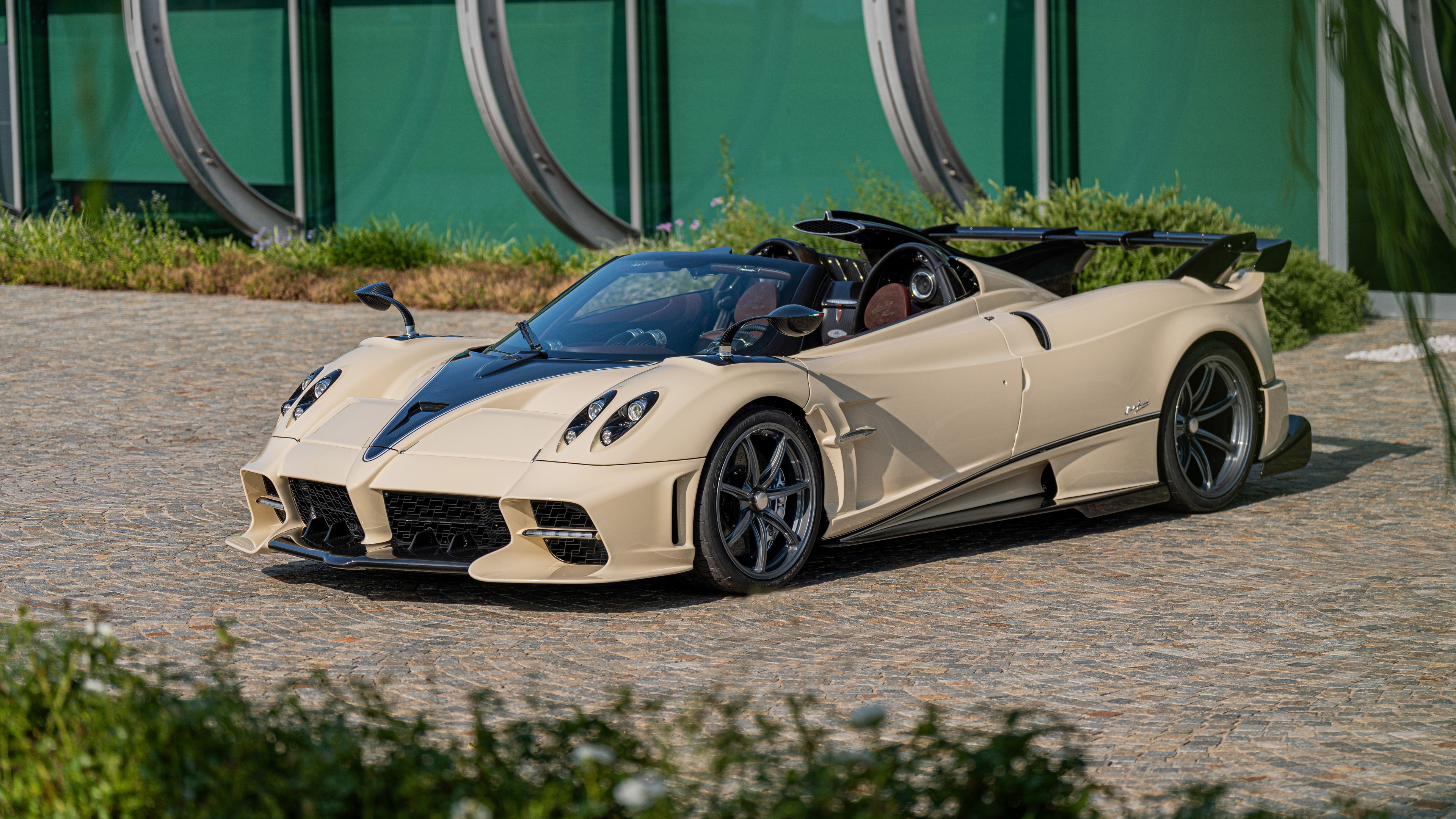 A high-detail 8K close-up of the Pagani Imola Roadster supercar, highlighting its aerodynamic curves and premium finish.