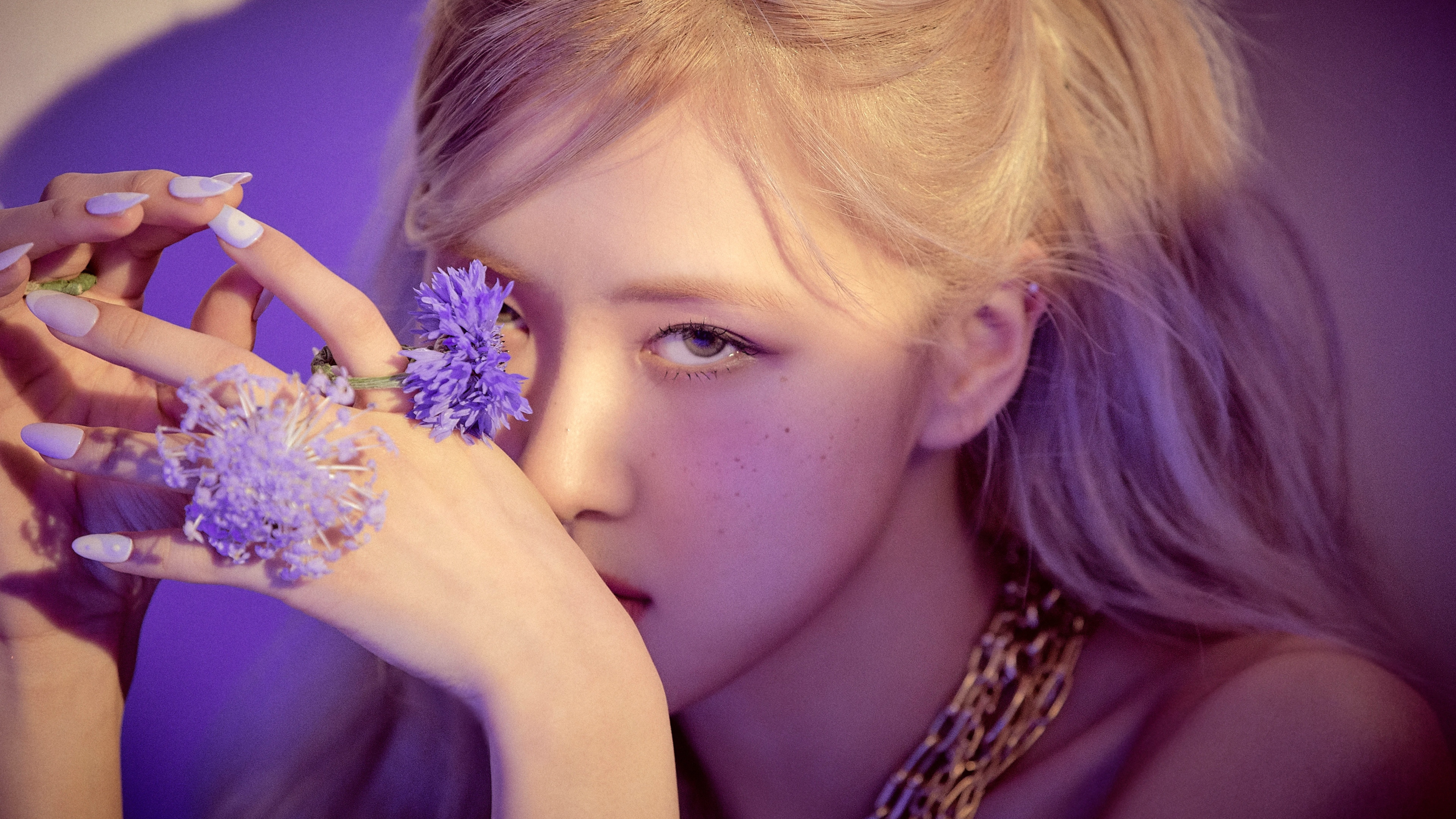 A high-resolution 5K teaser image of Rosé from Blackpink featuring a dreamy purple aesthetic.