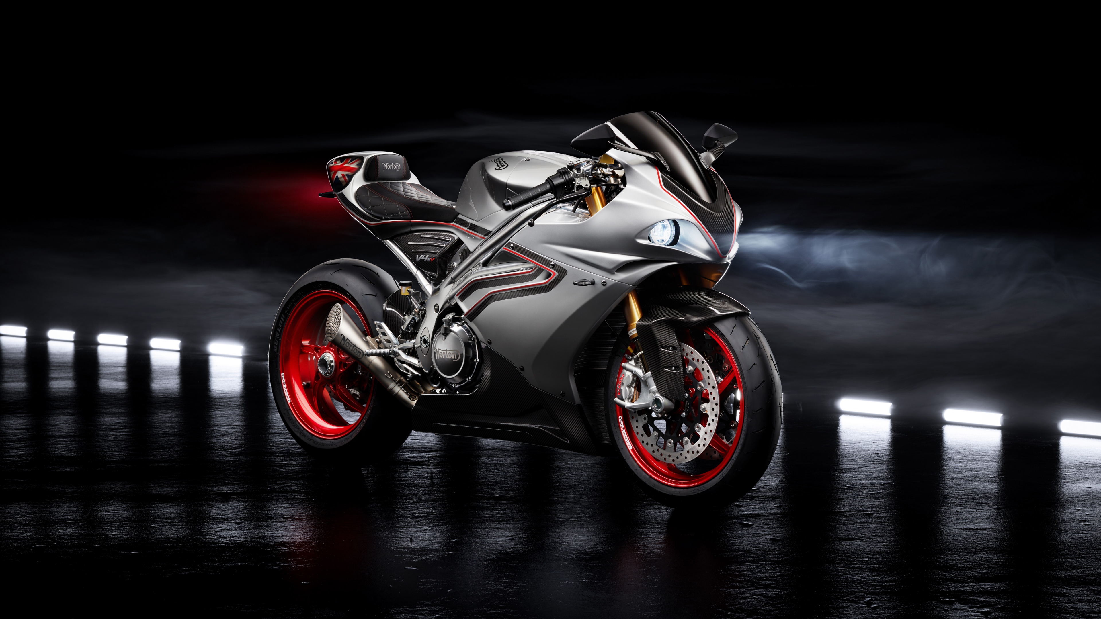 A collection of sleek 2022 superbike models positioned against a dark, moody background highlighting their aerodynamic curves and high-detail engineering.
