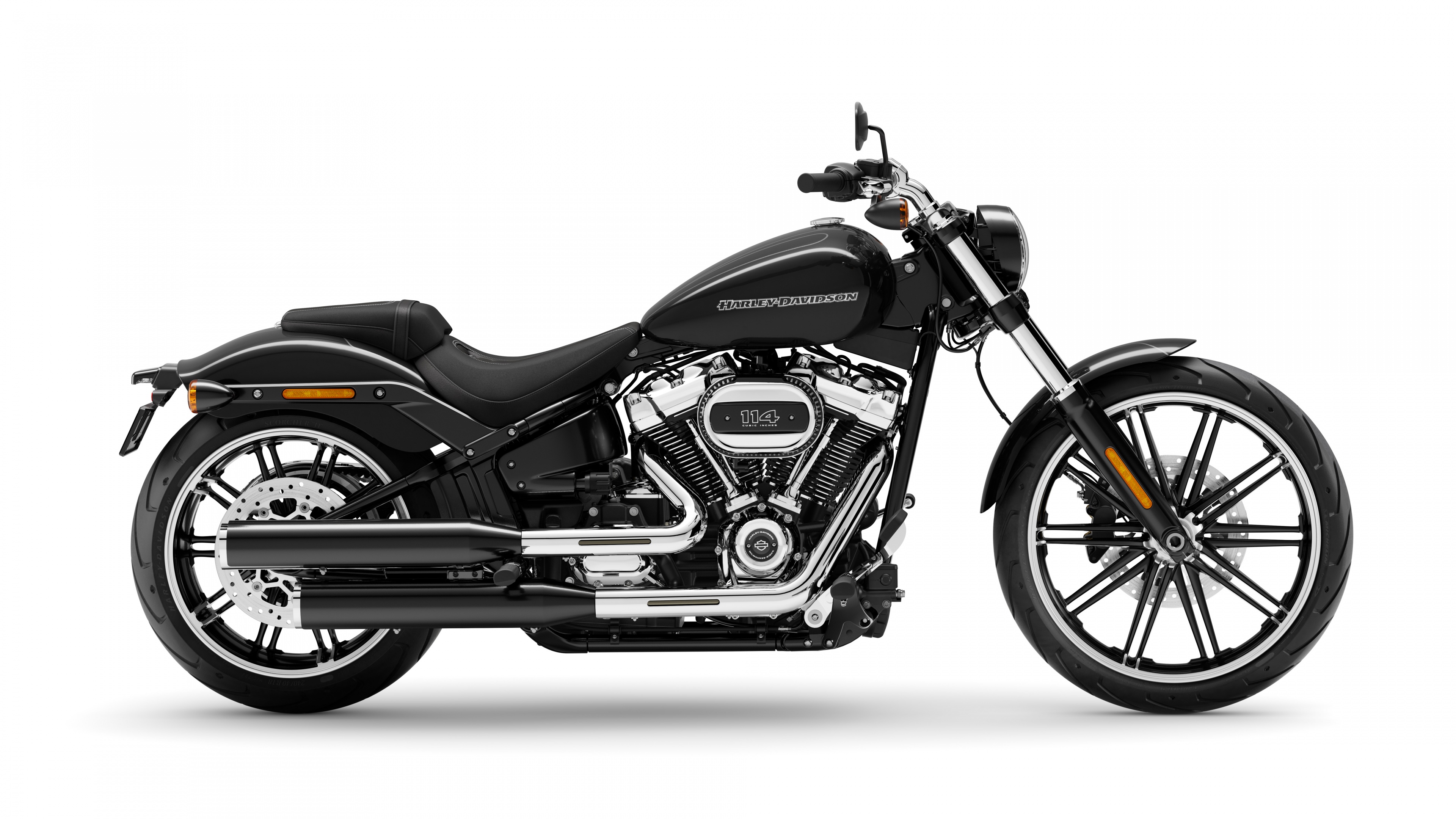 A high-resolution 8K studio shot of a sleek cruiser motorcycle against a plain white background.