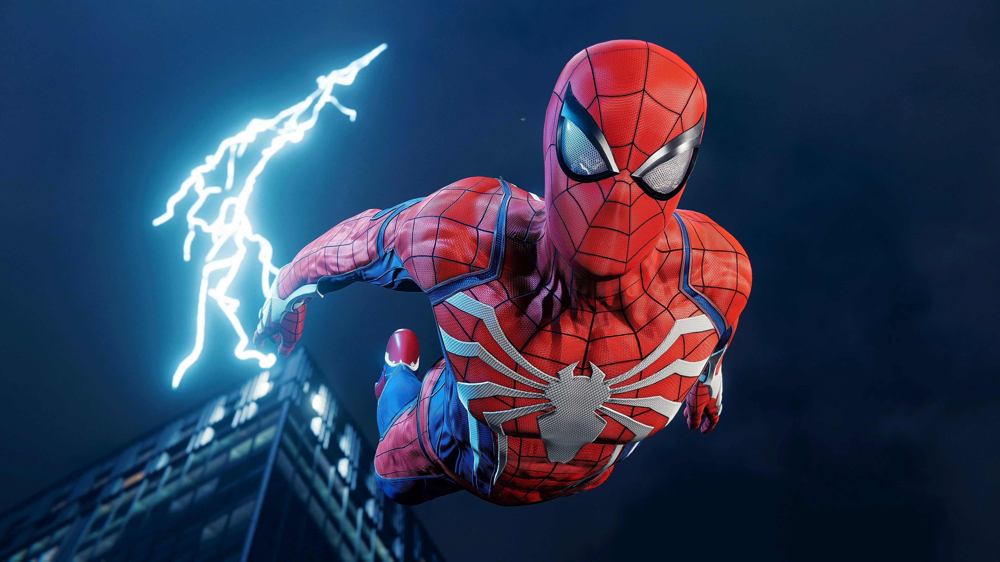 Spider-Man posing heroically in a scene from Marvel's Spider-Man Remastered