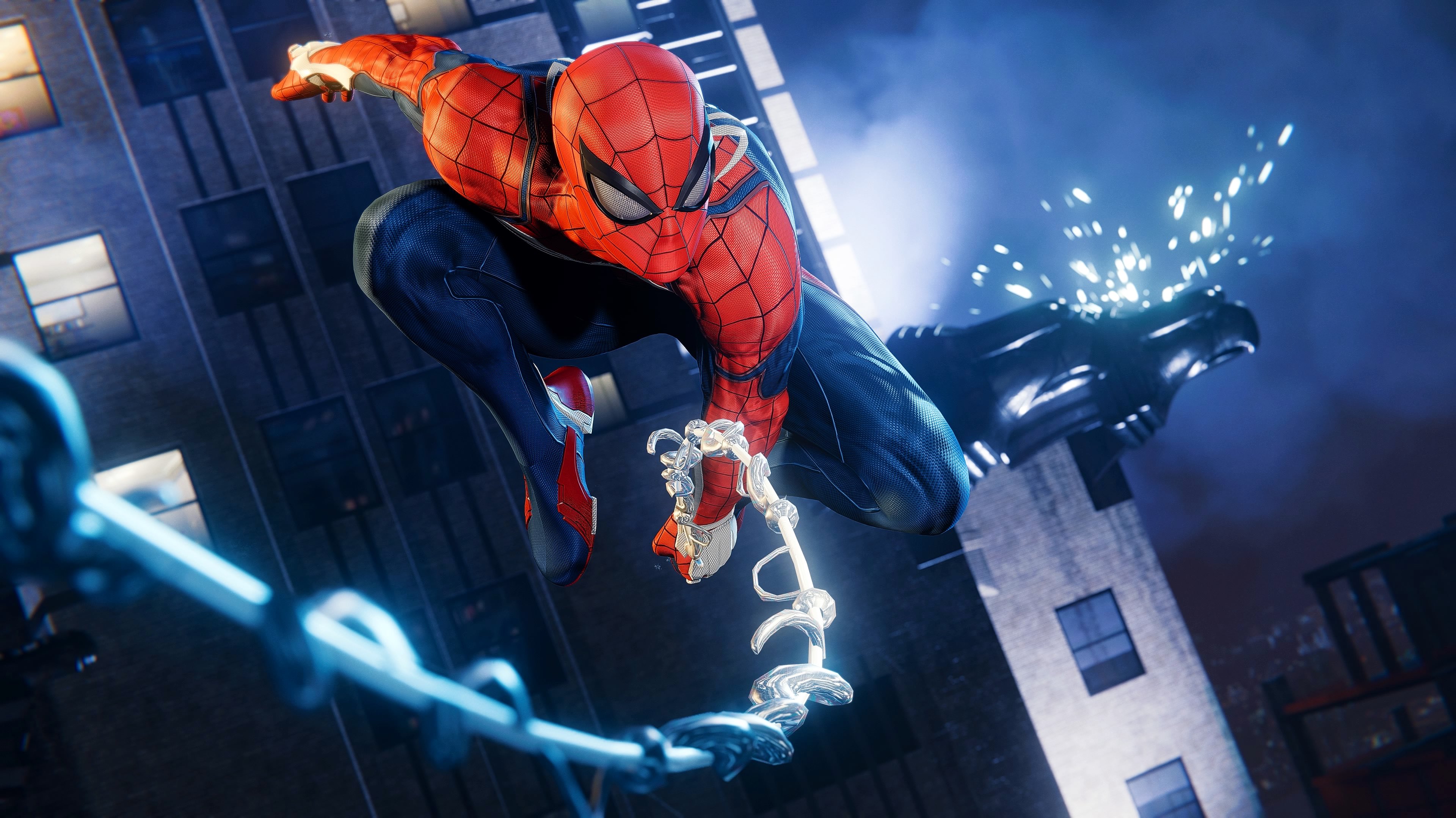 Spider-Man swinging between buildings in New York City from Marvel's Spider-Man Remastered.