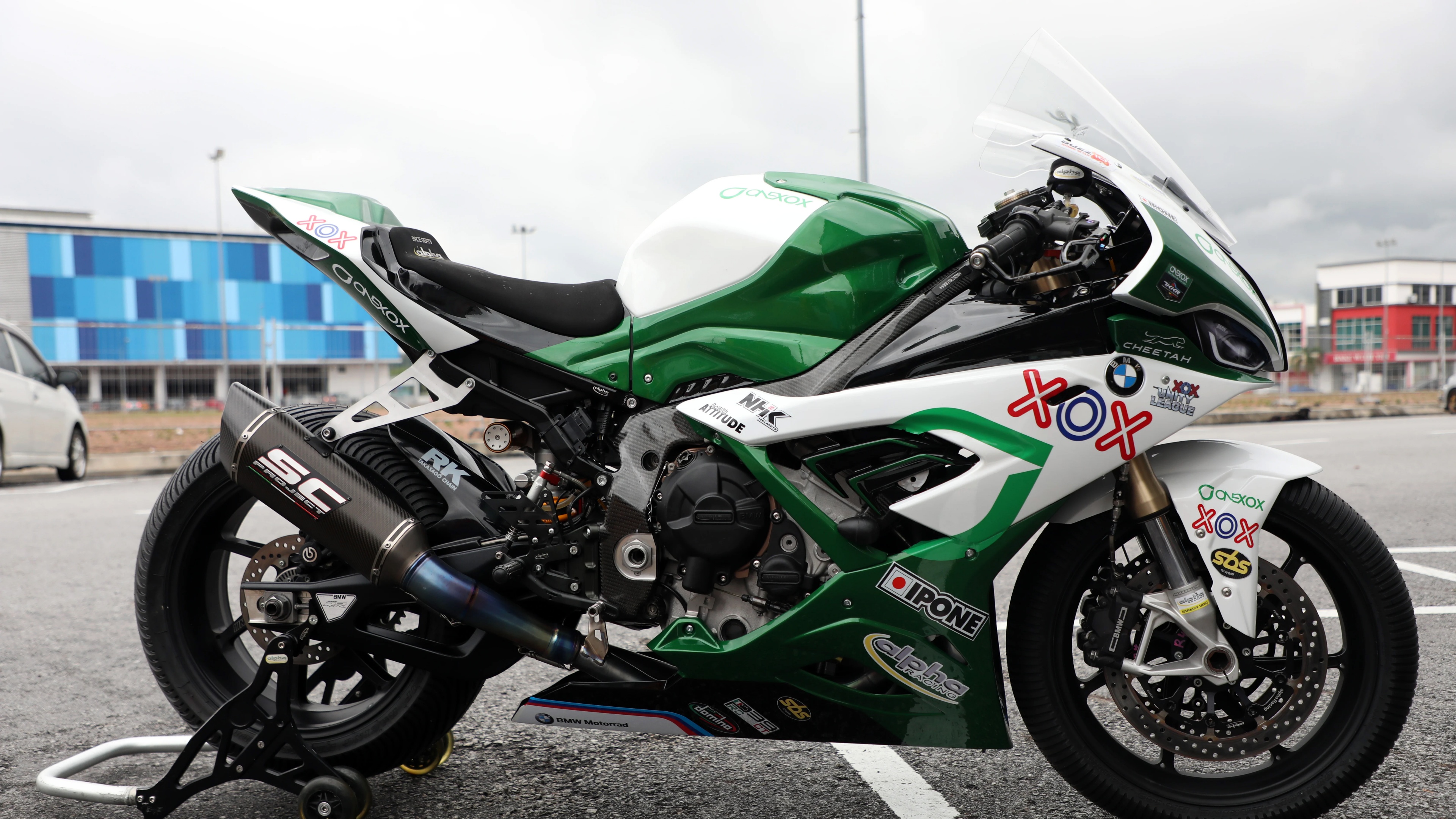 A high-resolution, detailed view of a 2022 BMW S1000RR racing motorcycle featuring sharp aerodynamic lines and a professional racing finish.