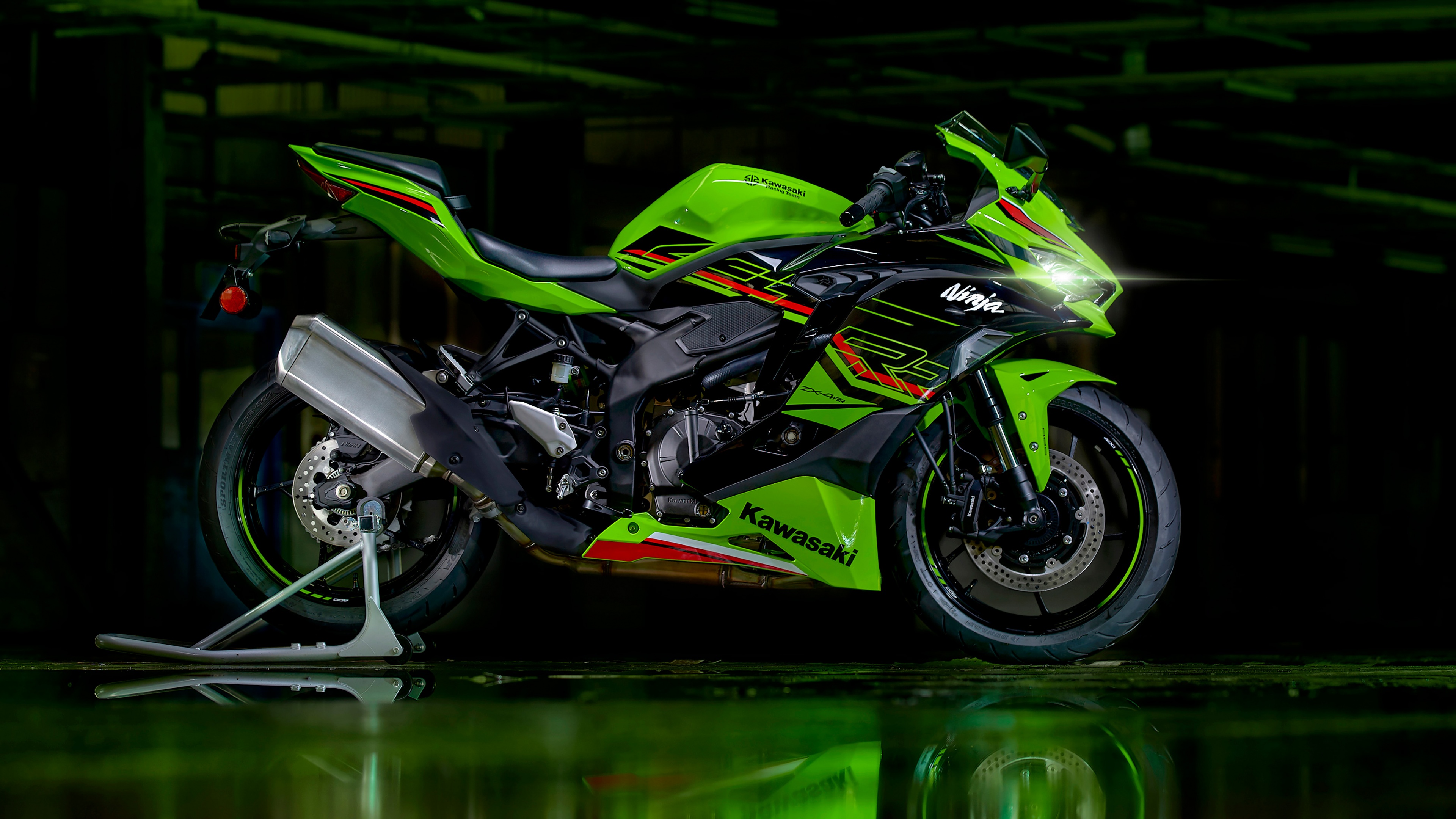 A high-performance 2023 Kawasaki Ninja ZX-4RR sports motorcycle with aggressive aerodynamic fairings and sleek design.