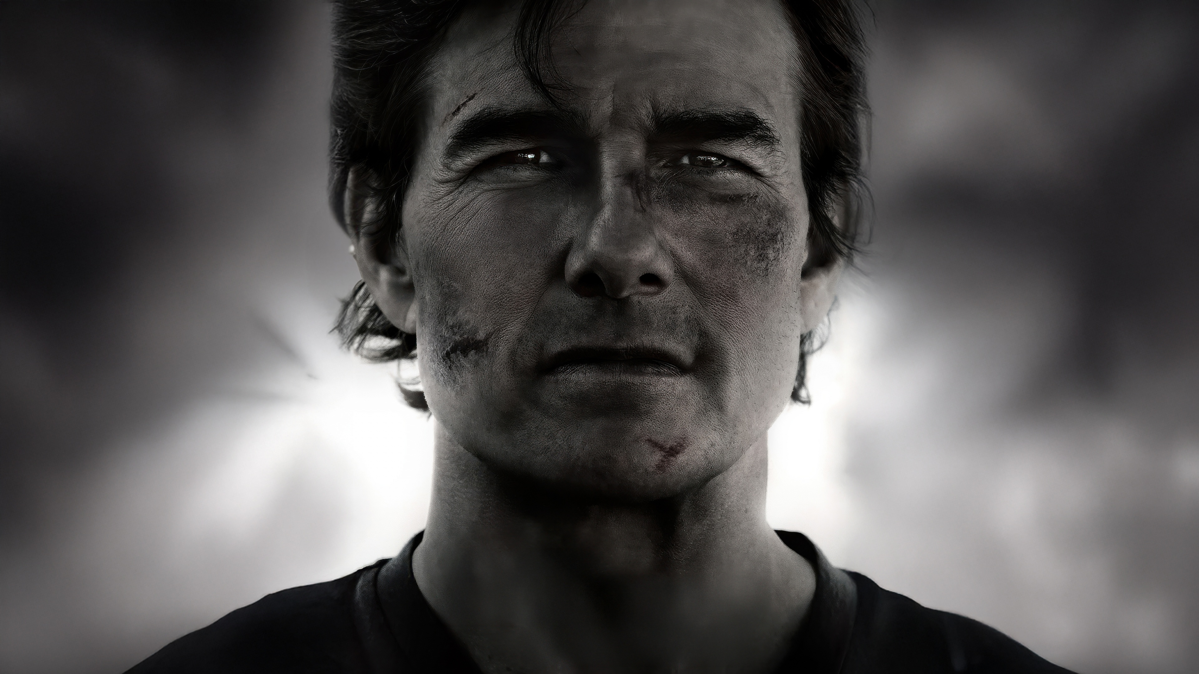A dramatic black and white cinematic portrait of Ethan Hunt, played by Tom Cruise, from Mission: Impossible - The Final Reckoning.