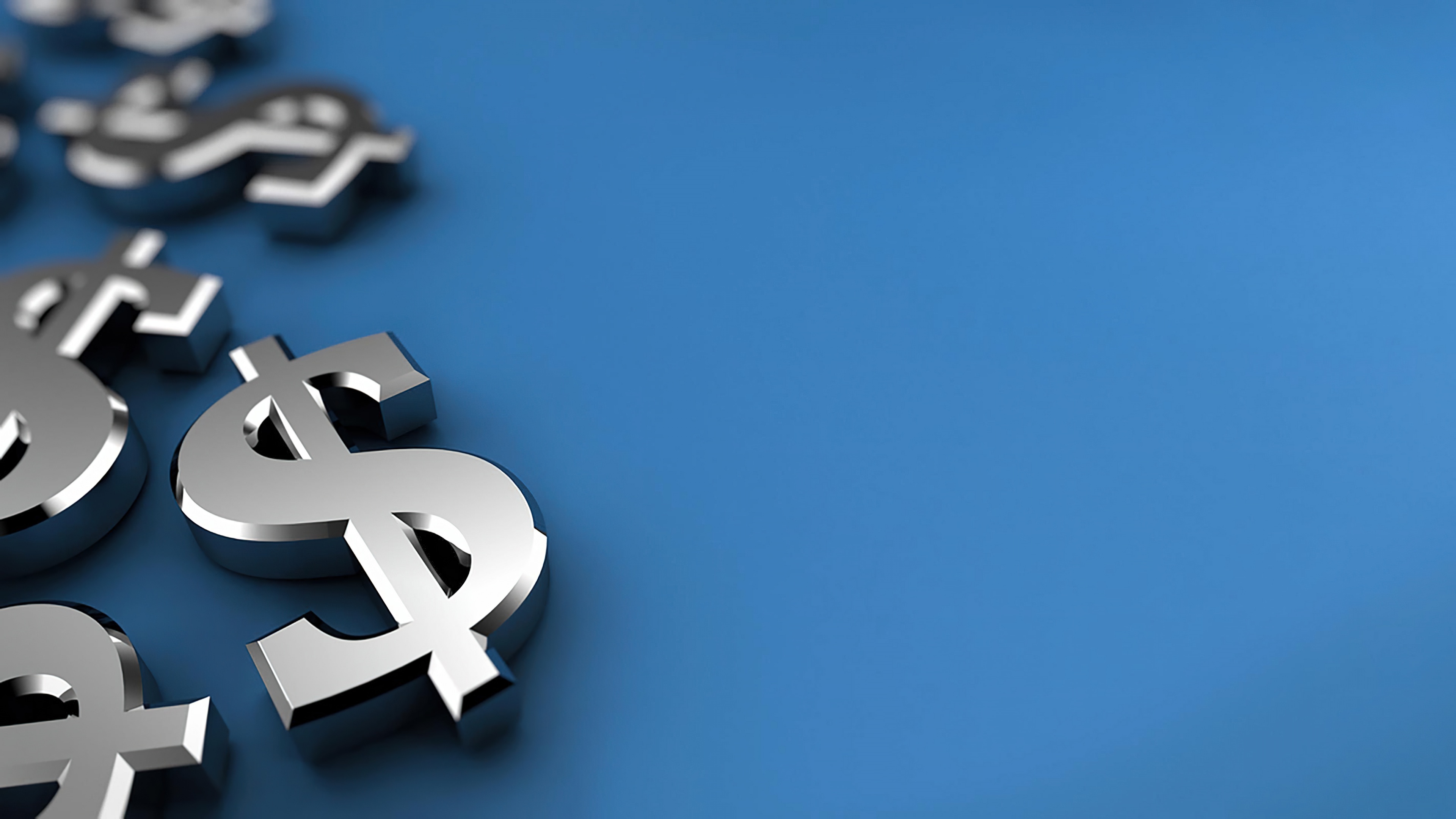 A close-up view of a single US dollar bill centered on a solid blue background.