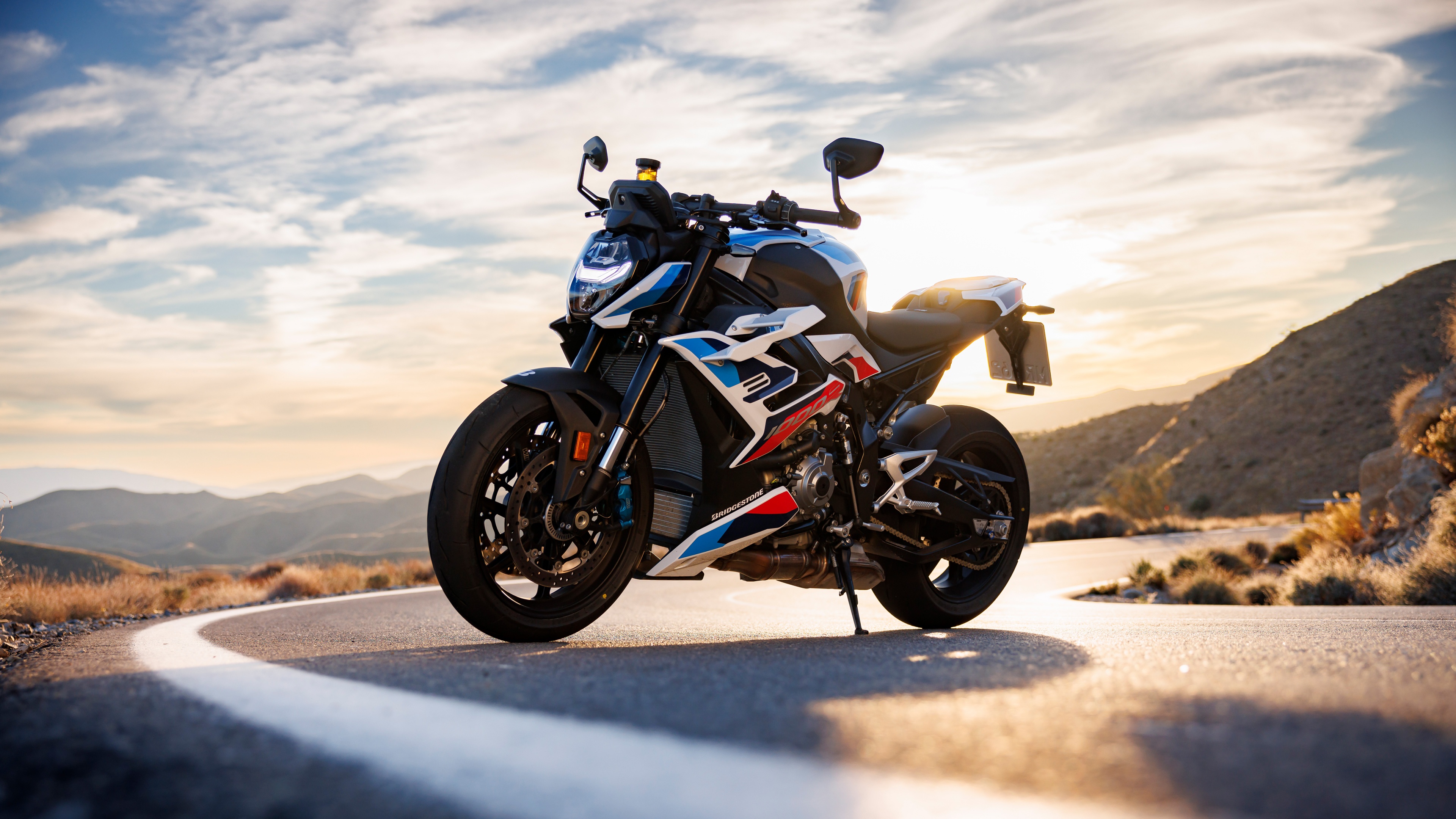 High-detail close-up of a BMW M 1000 R sports motorcycle showcasing its aerodynamic design.