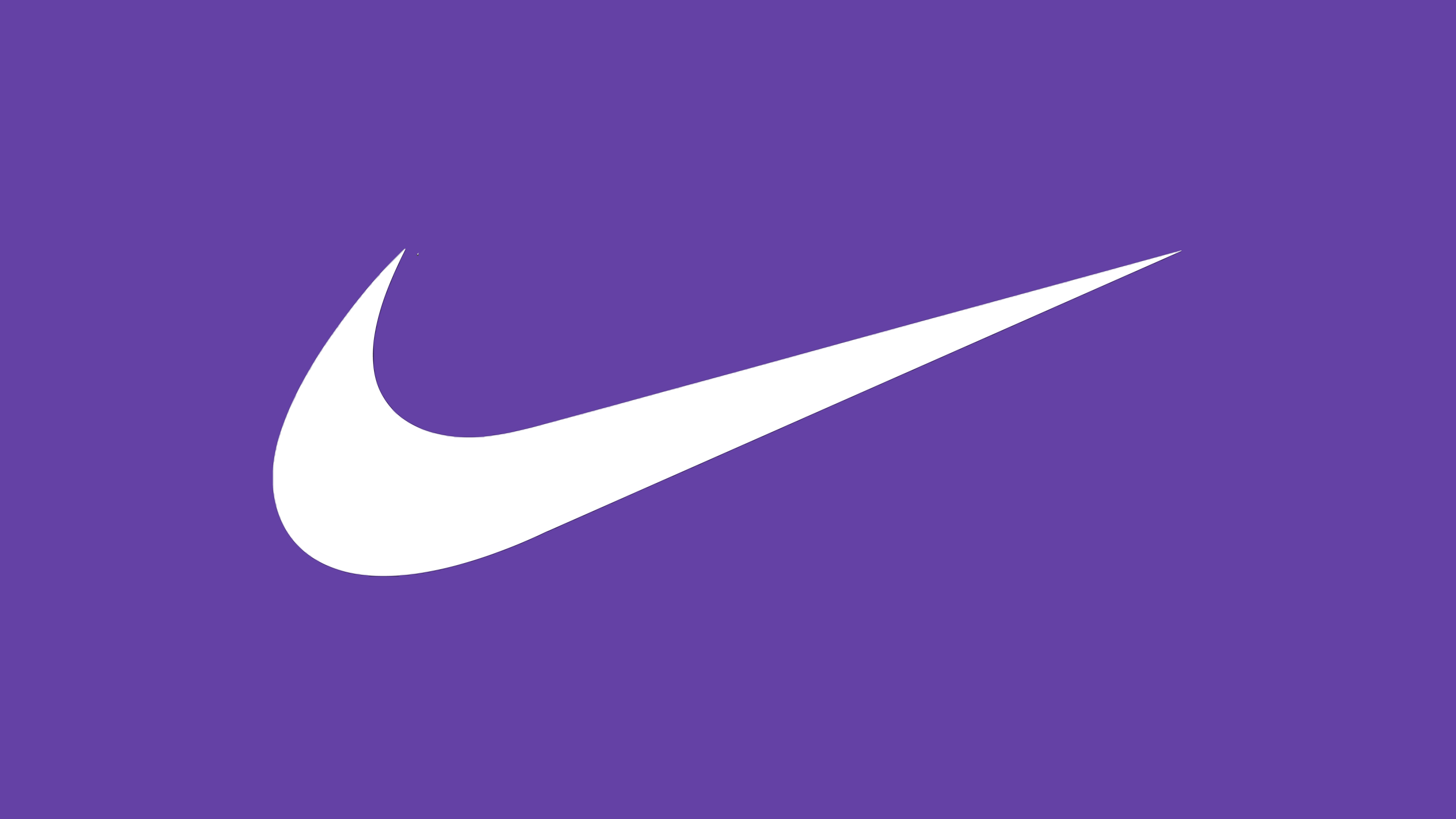 The Nike logo centered on a solid, deep purple background