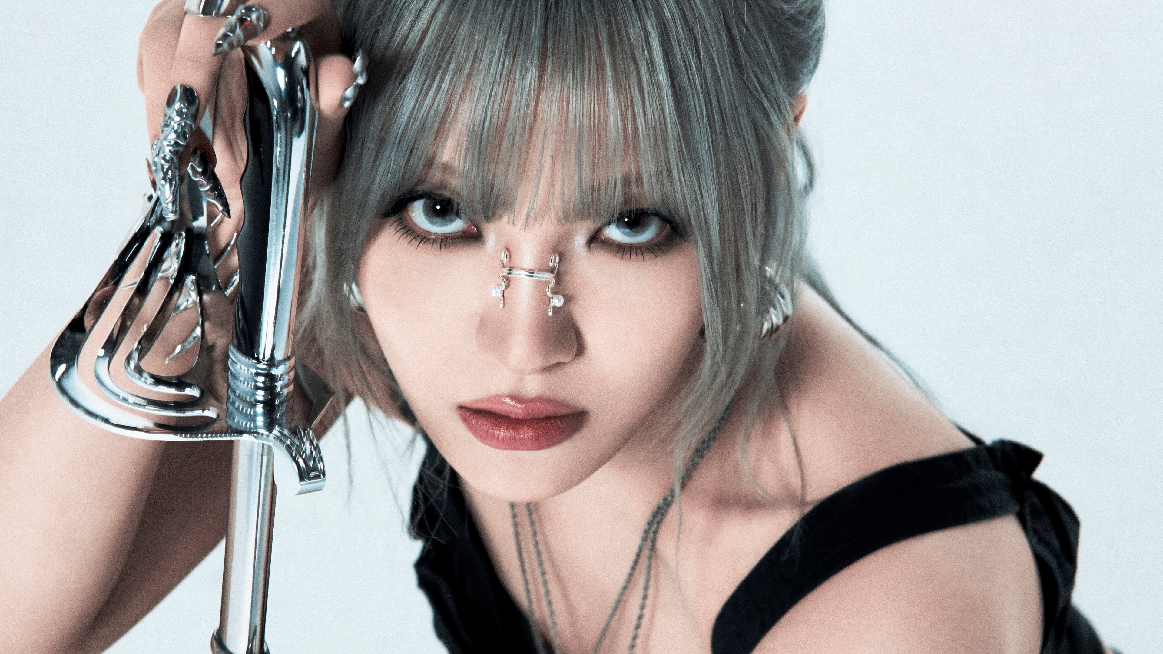 A cinematic, high-resolution close-up portrait of South Korean rapper Moon Sua from tripleS.
