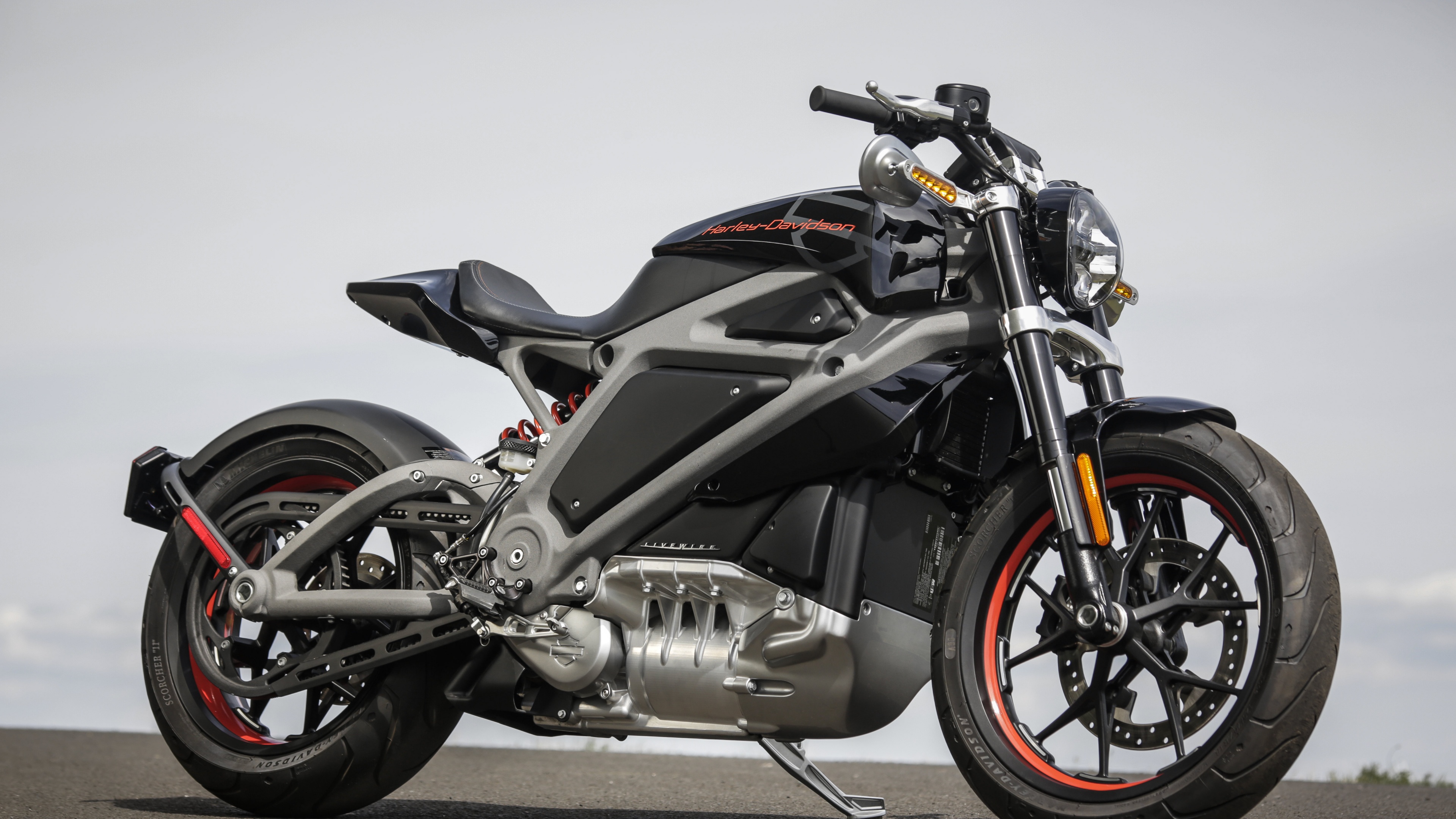 A detailed close-up of a 2022 Harley-Davidson LiveWire electric motorcycle showing its sleek metallic frame and modern design.